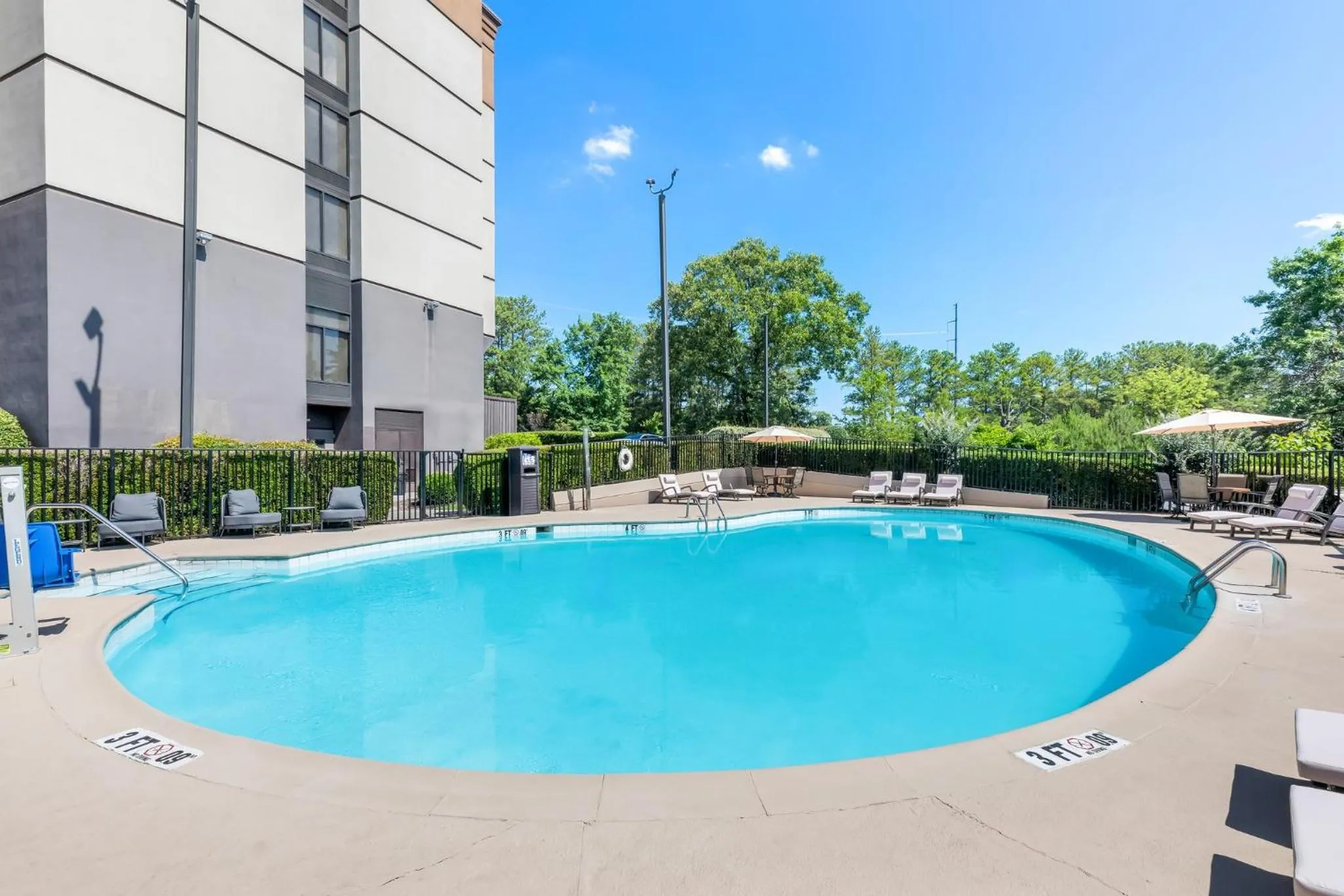 Swimming pool in Holiday Inn Express Atlanta Galleria-Ballpark Area by IHG