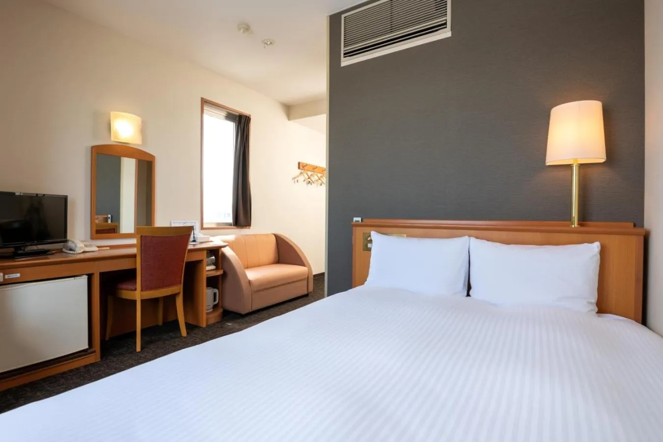 Bed in Moriyama Art Hotel