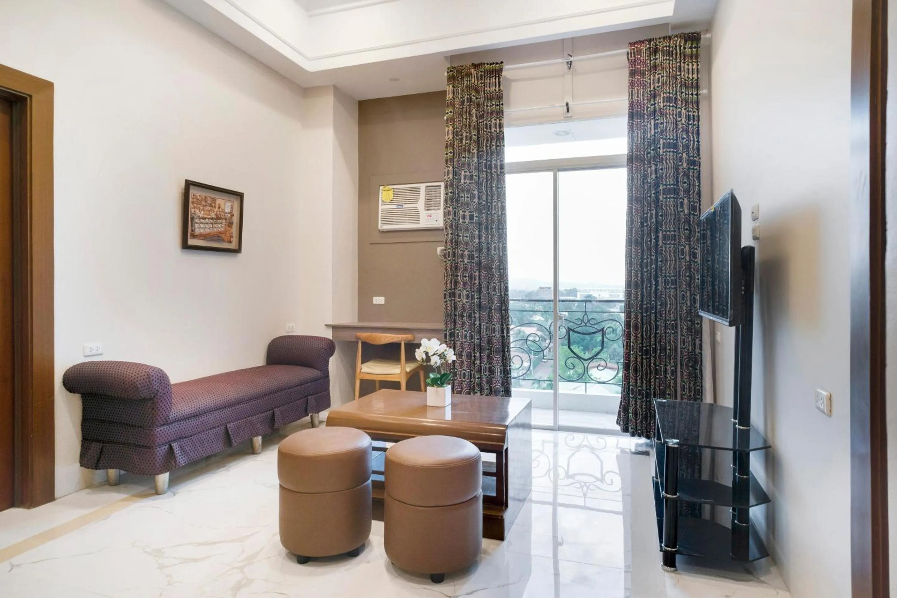 Bedroom in Capital O 460 World Palace Hotel