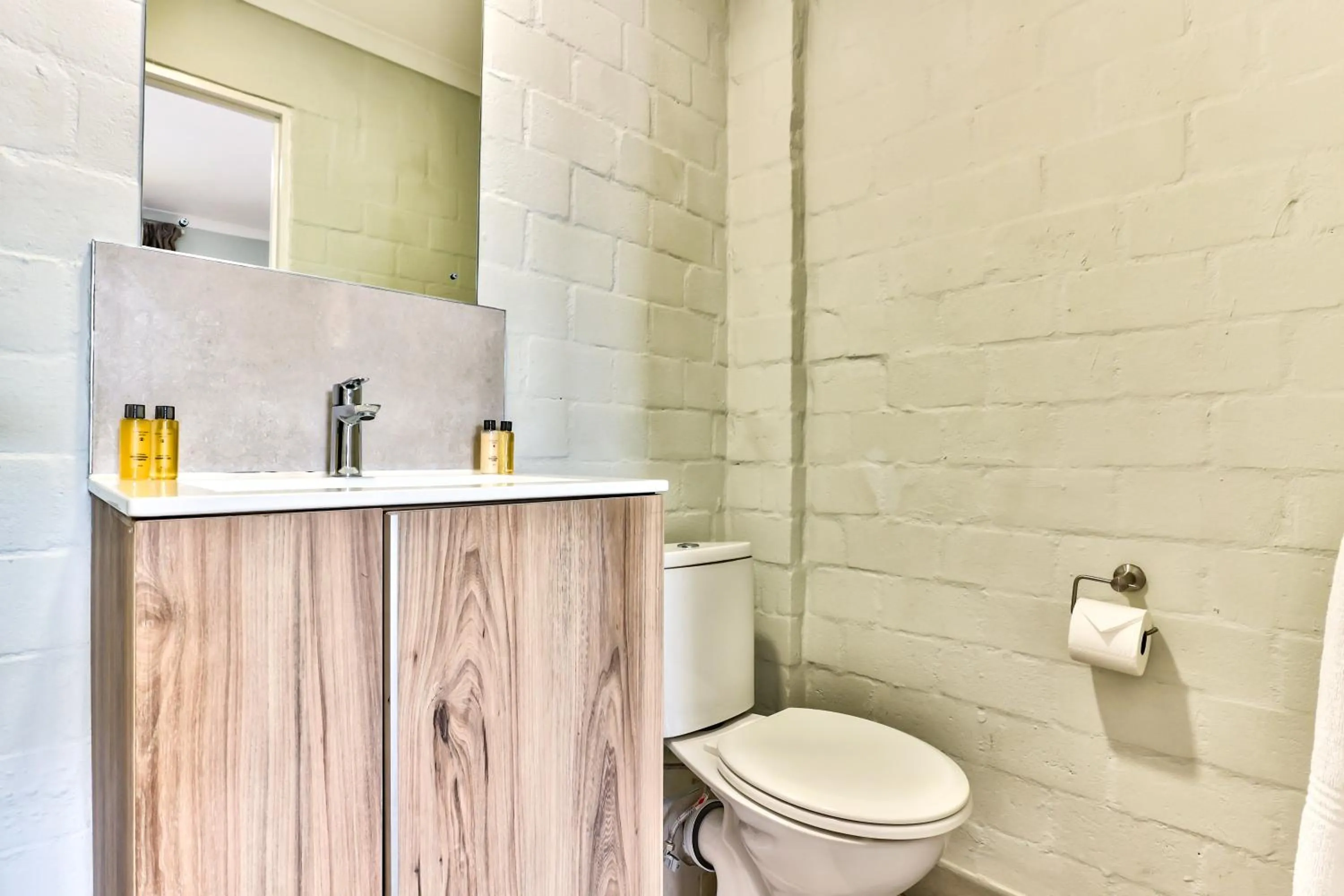 Toilet in WINK Aparthotel Eaton Square