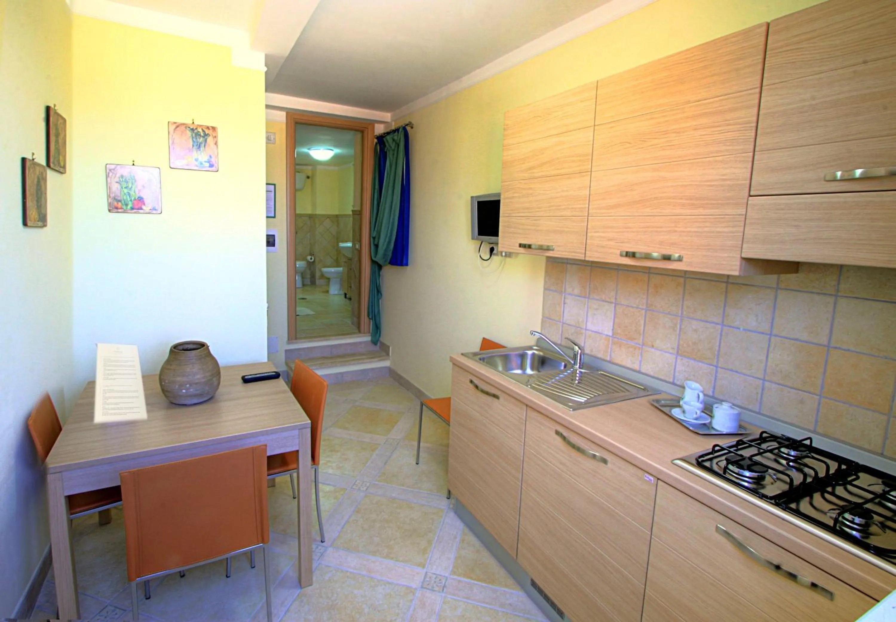 Kitchen or kitchenette in Posidonia Residence