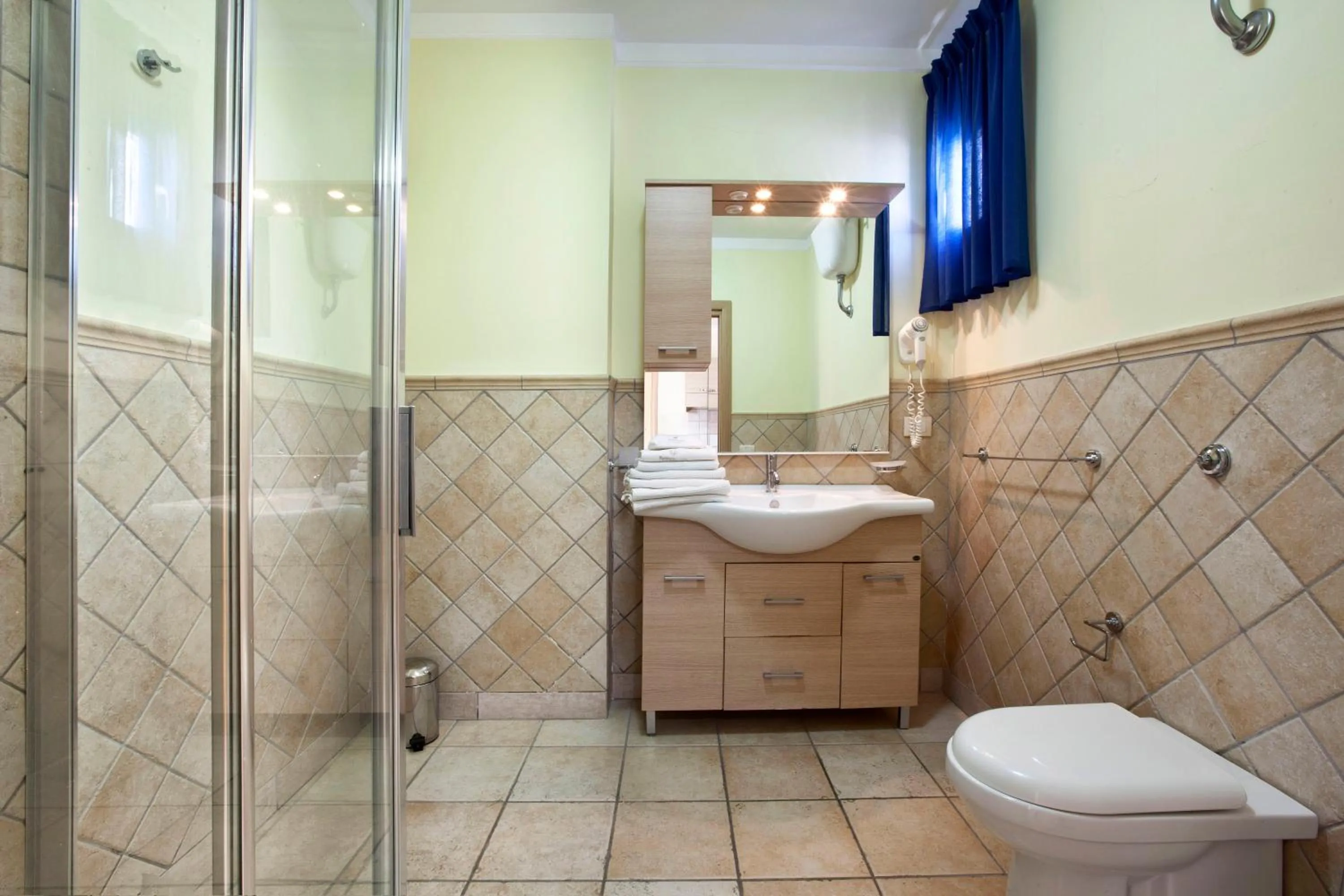 Bathroom in Posidonia Residence