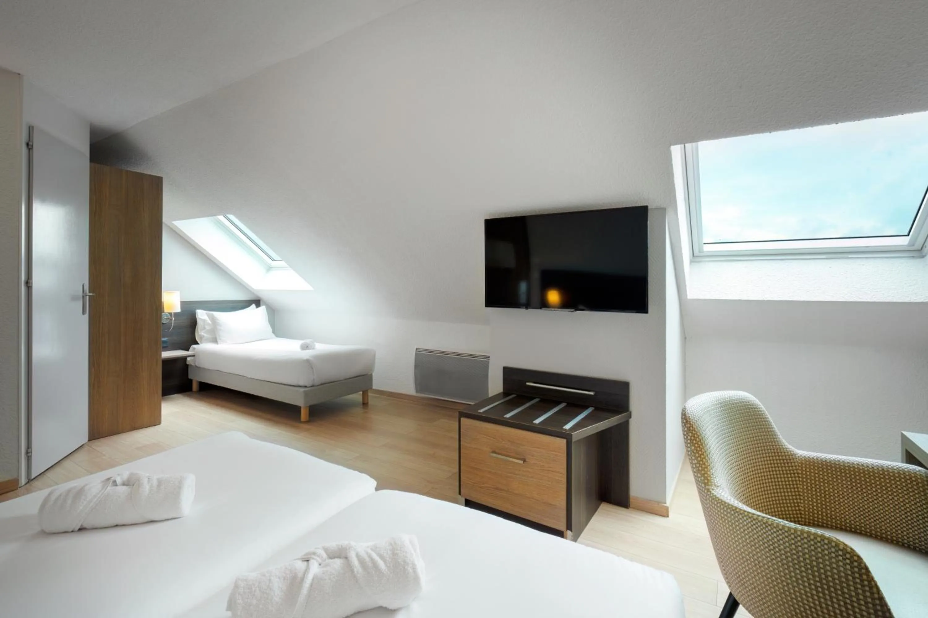 Photo of the whole room, Bed in Kyriad Belfort Centre Gare