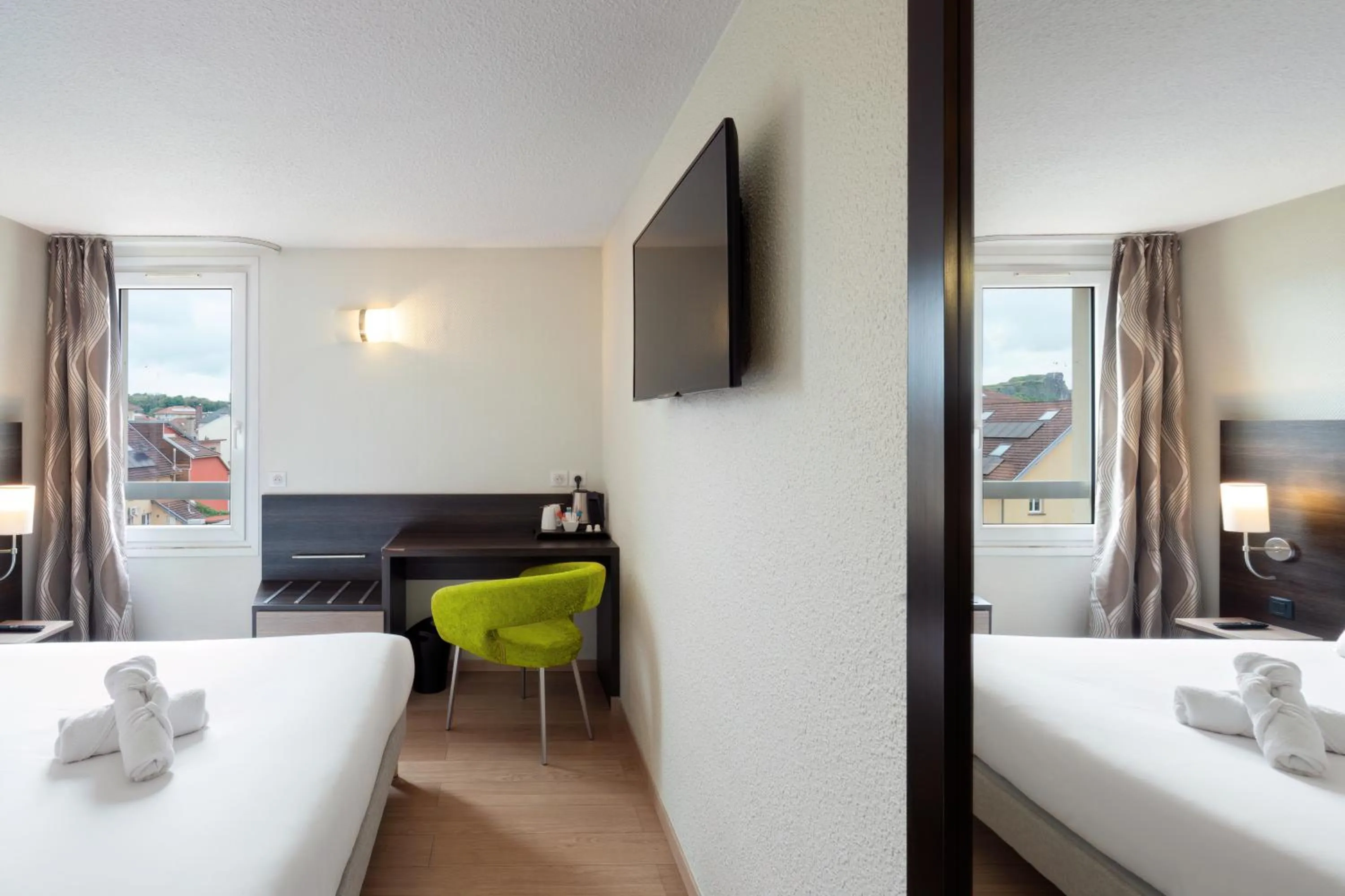 Bedroom, Bed in Kyriad Belfort Centre Gare