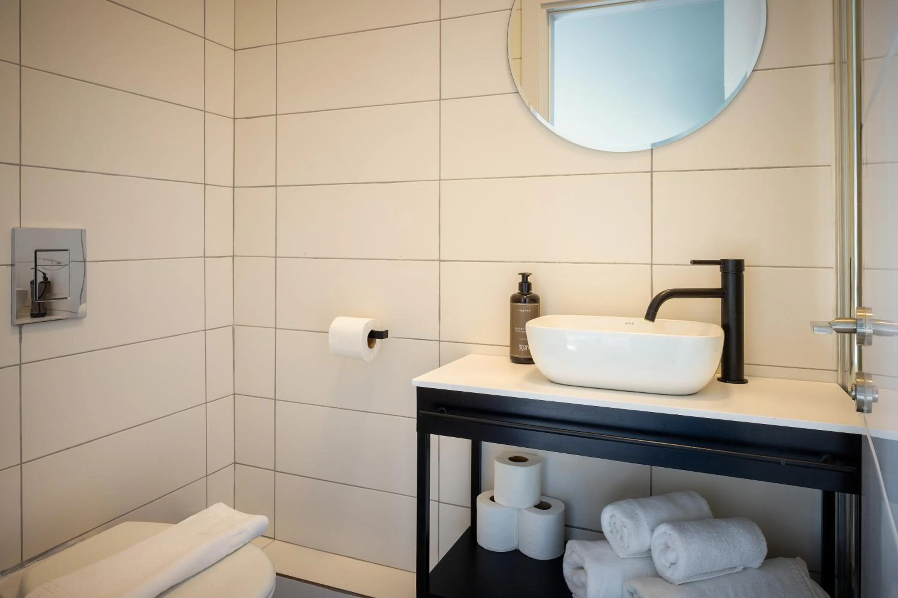 Bathroom in Monochrome - by Loginn Tel-Avivian hotels