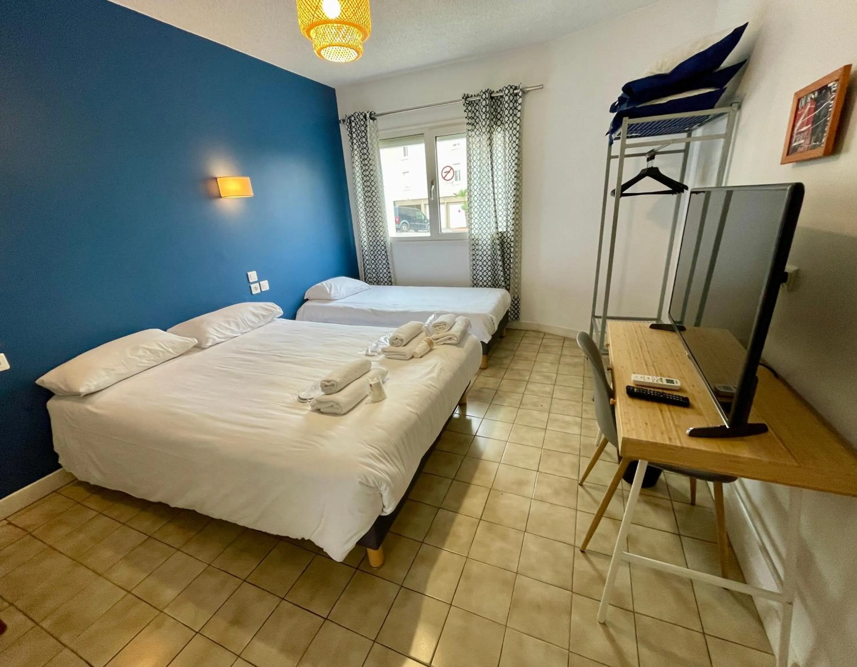 Bed in Hotel AMERIQUE