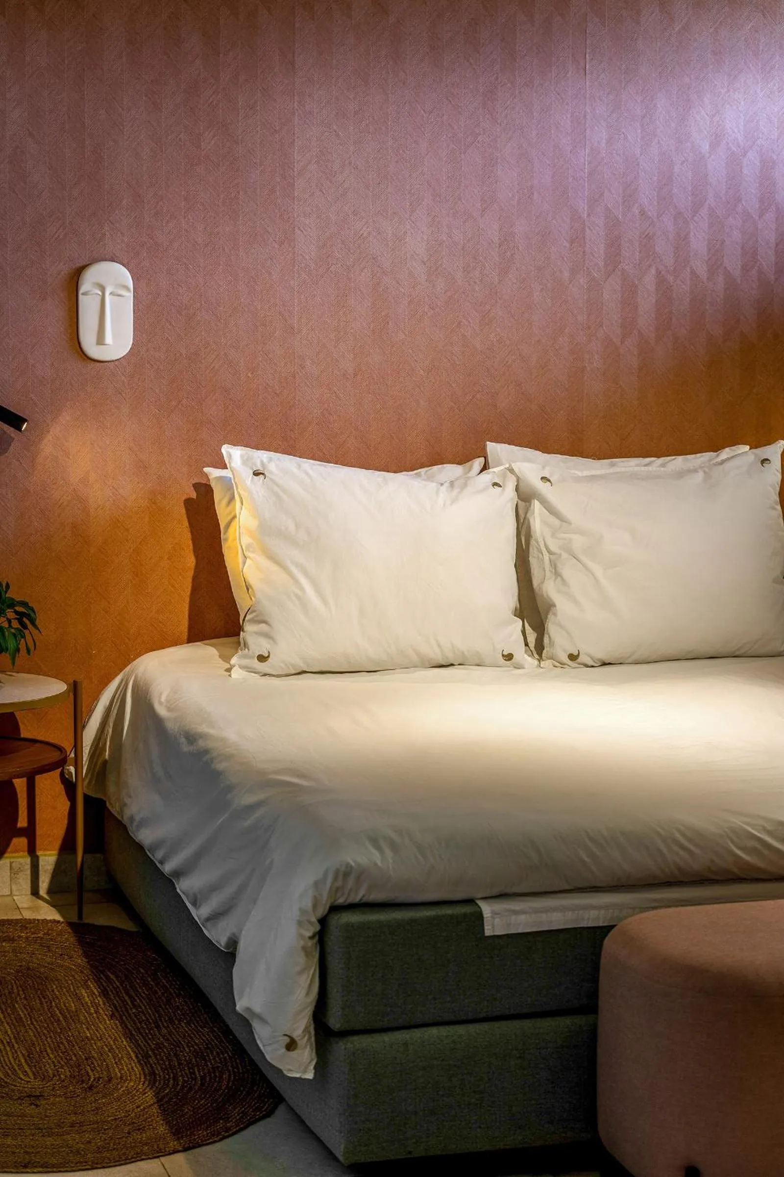 Bed in SENSES Boutique Hotel & Apartments