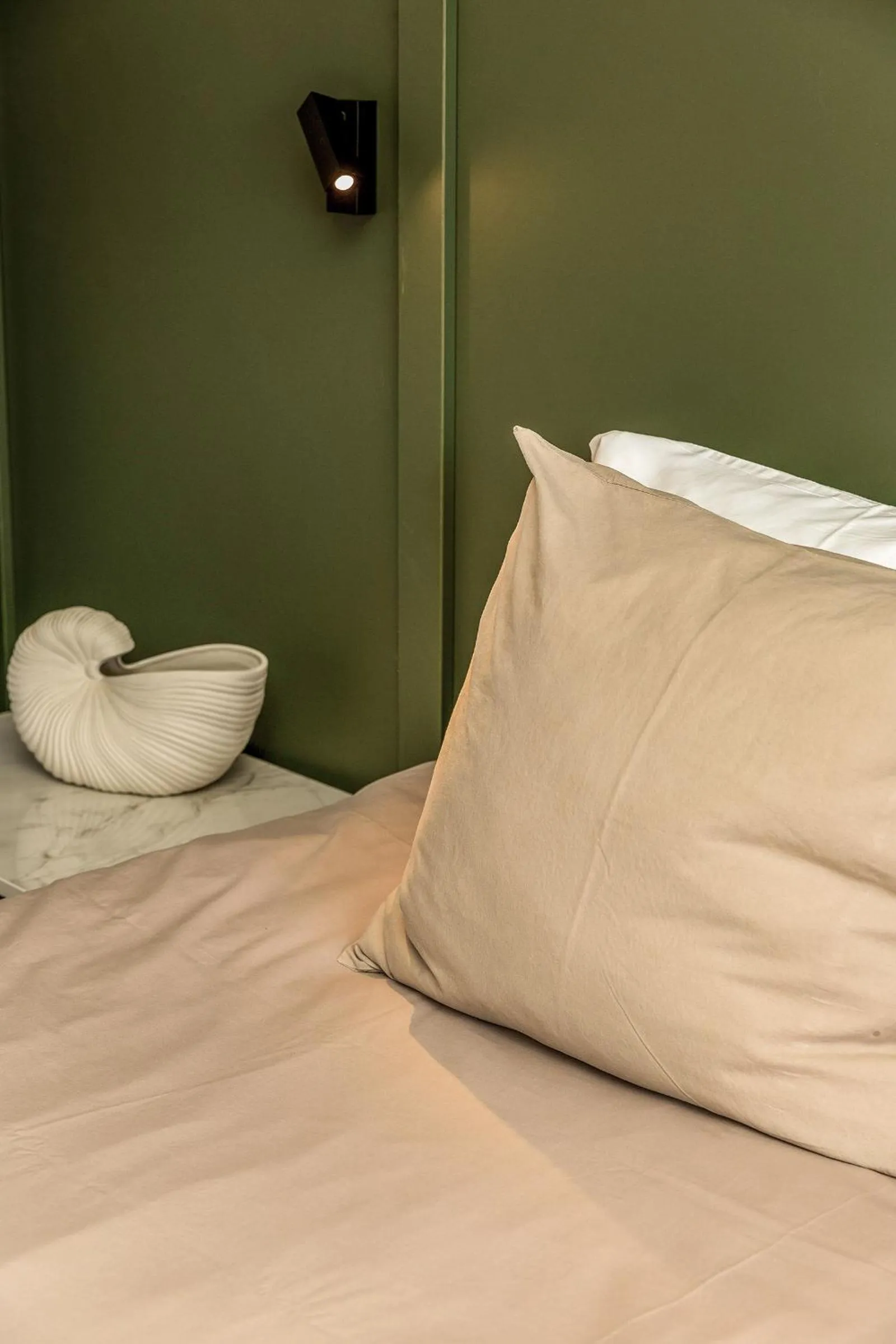 Bed in SENSES Boutique Hotel & Apartments