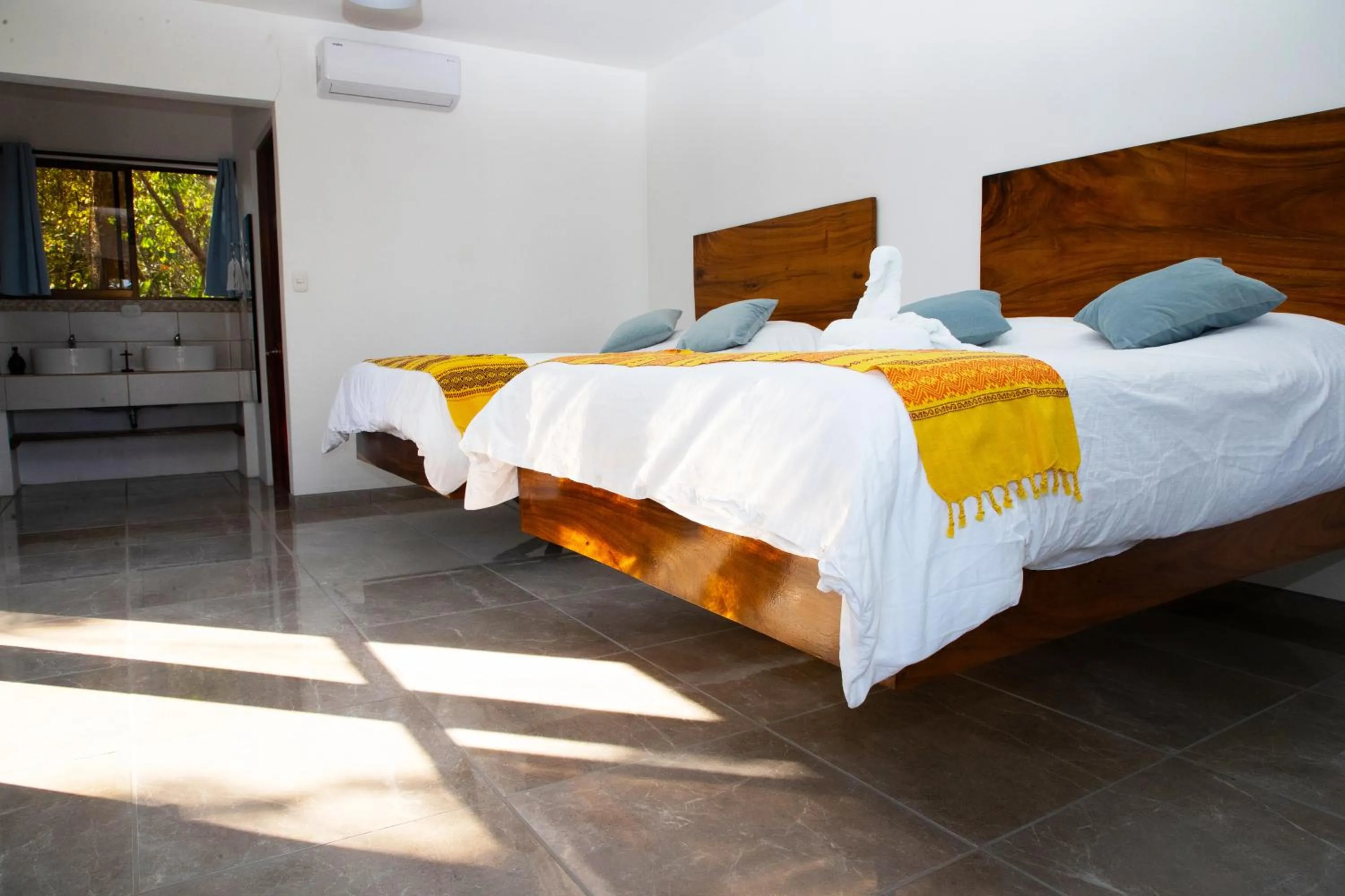 Bed in Jungle Lodge at Wild Sun Rescue Center