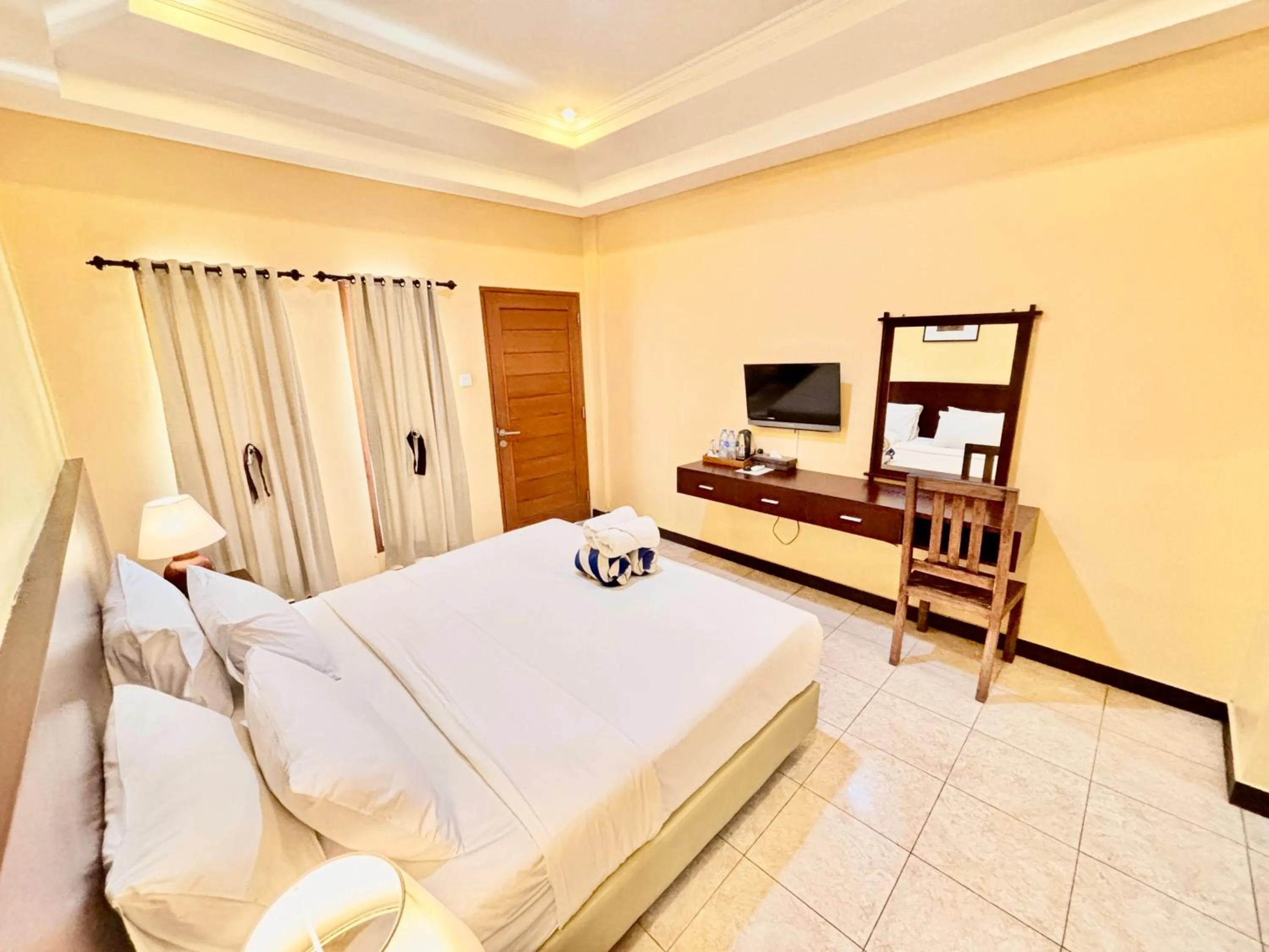 Bed in Segara Agung Boutique Hotel