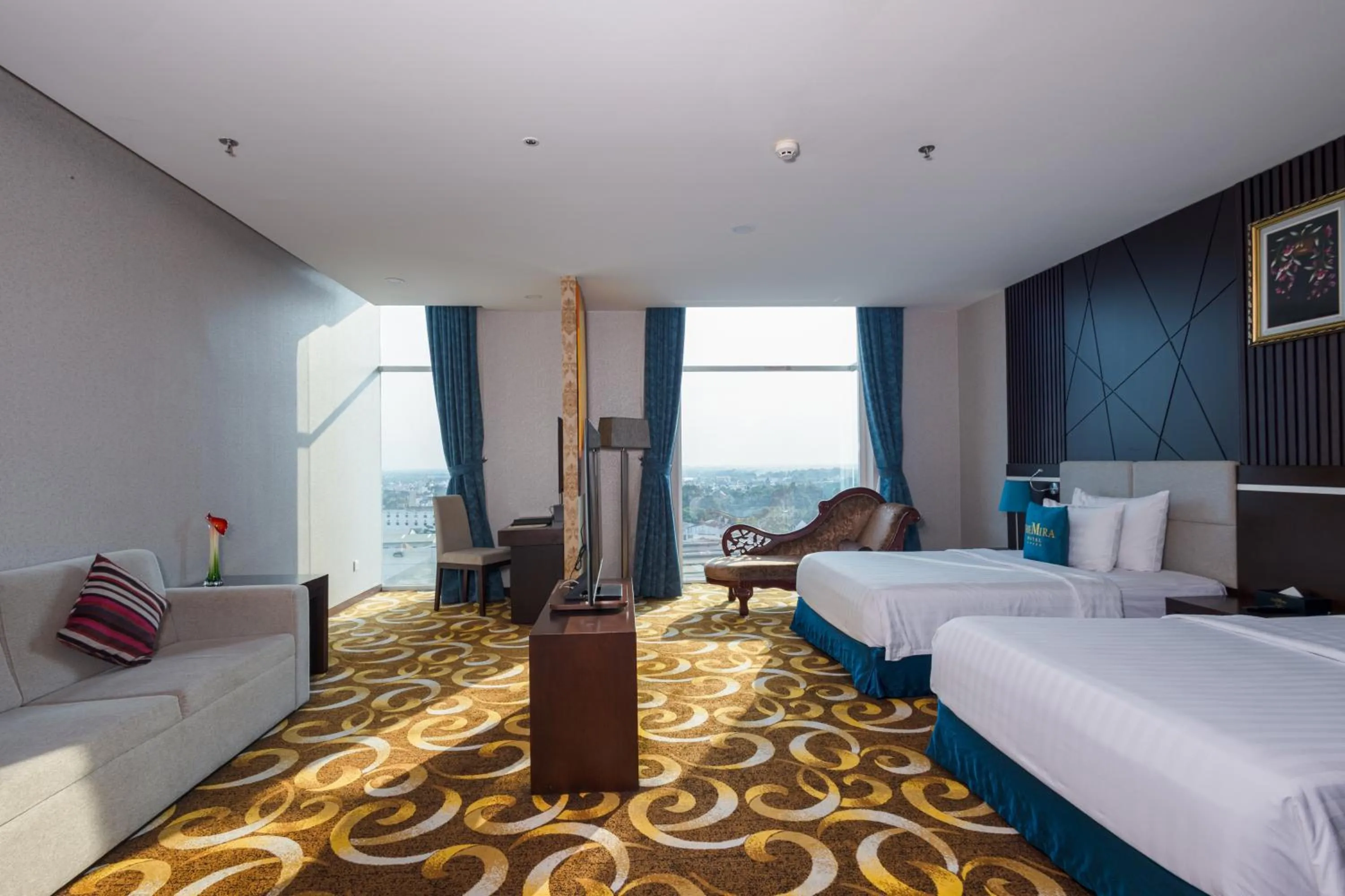 Bed in The Mira Hotel