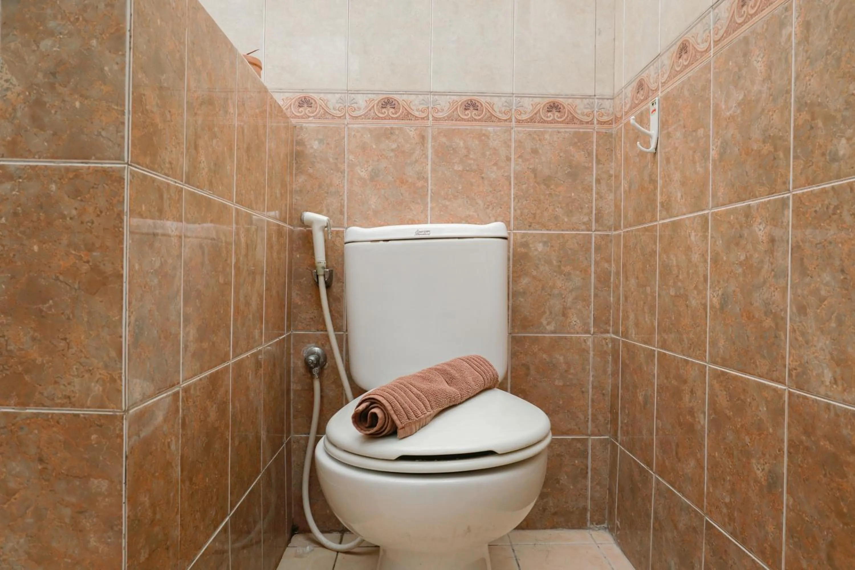 Bathroom in Big and Cozy Studio Apartment at Puri Garden By Travelio