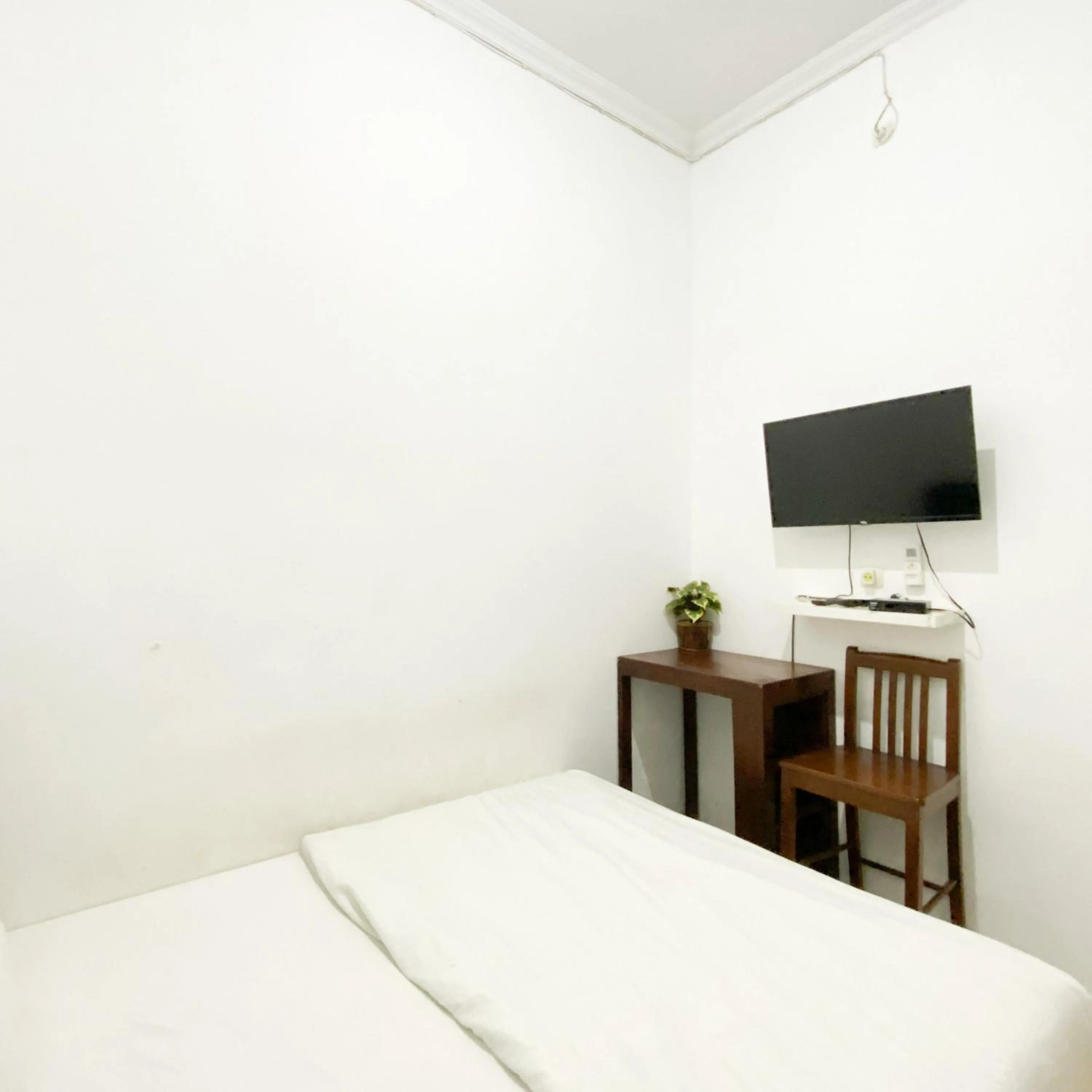 Bedroom in The Eco Village Homestay RedPartner