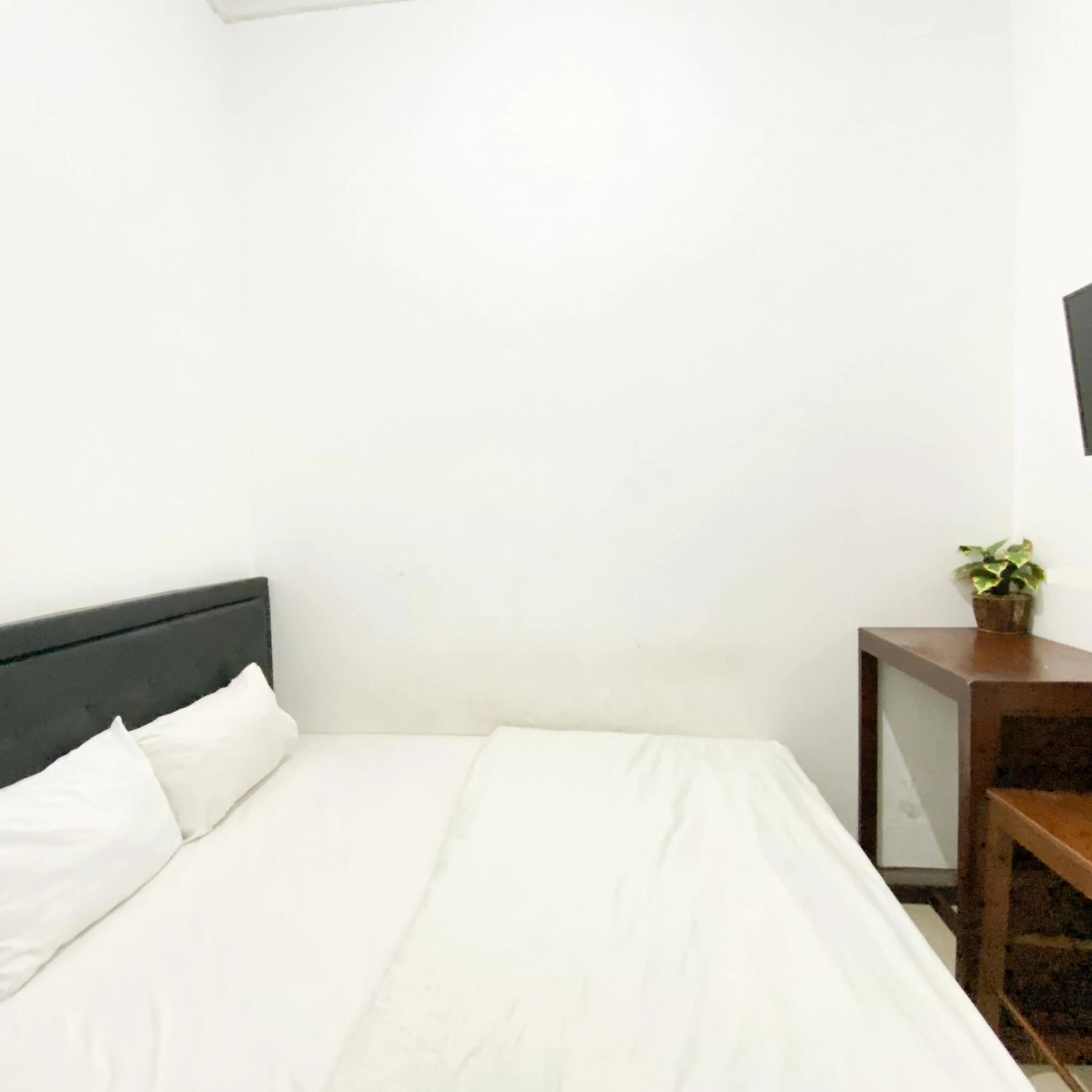 Bedroom in The Eco Village Homestay RedPartner