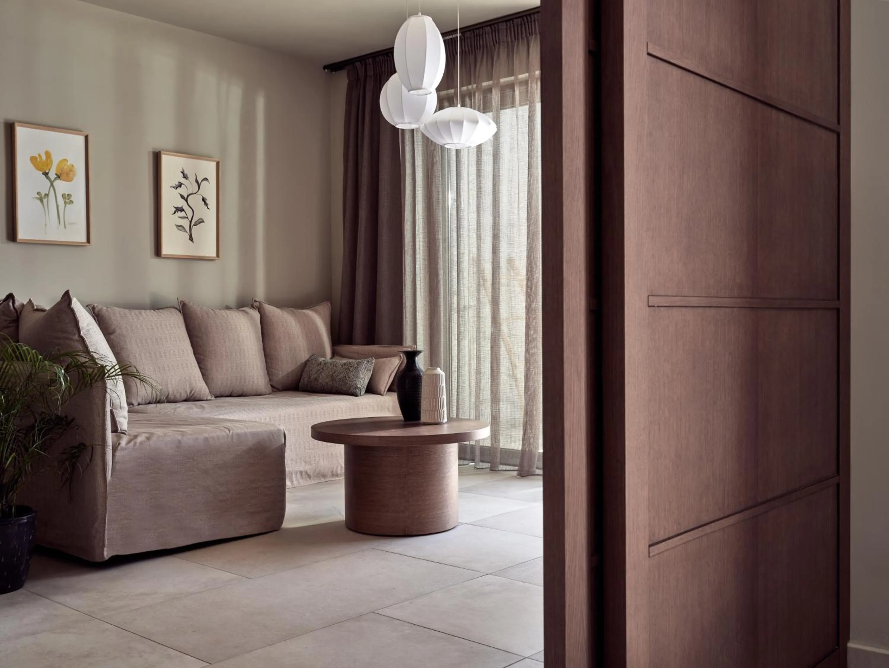 Living room in The Royal Senses Resort & Spa Crete, Curio Collection by Hilton