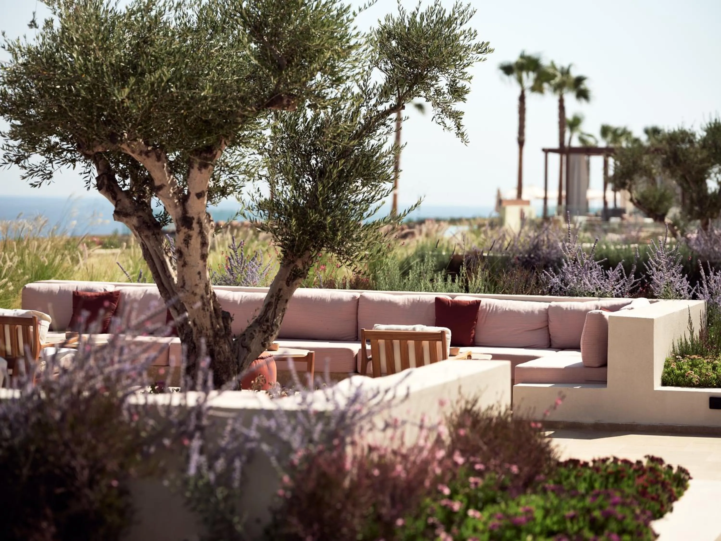 Lounge or bar in The Royal Senses Resort & Spa Crete, Curio Collection by Hilton