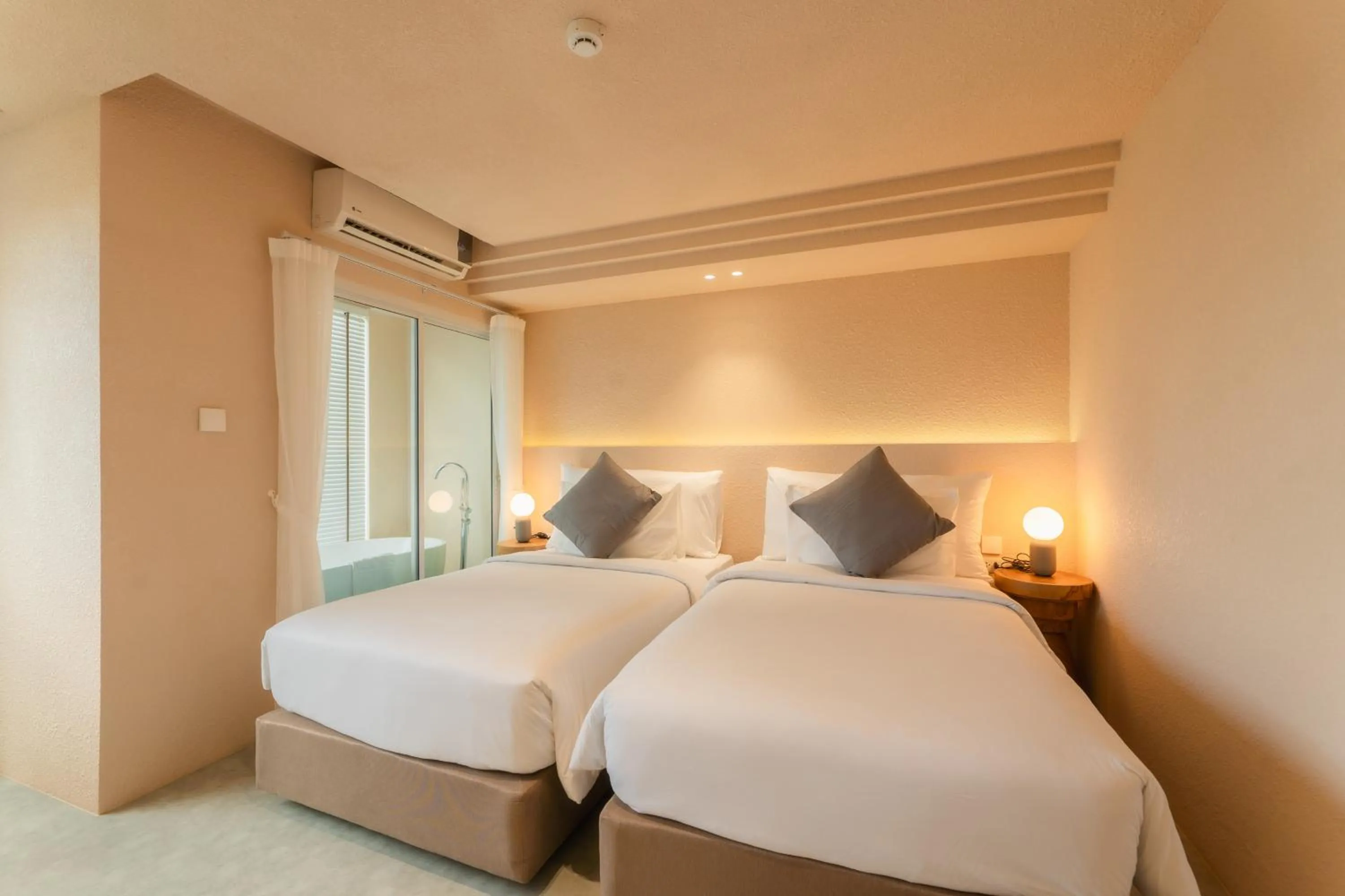 Bed in Mai Hotel Chiang Mai ใหม่โฮเทล เชียงใหม่