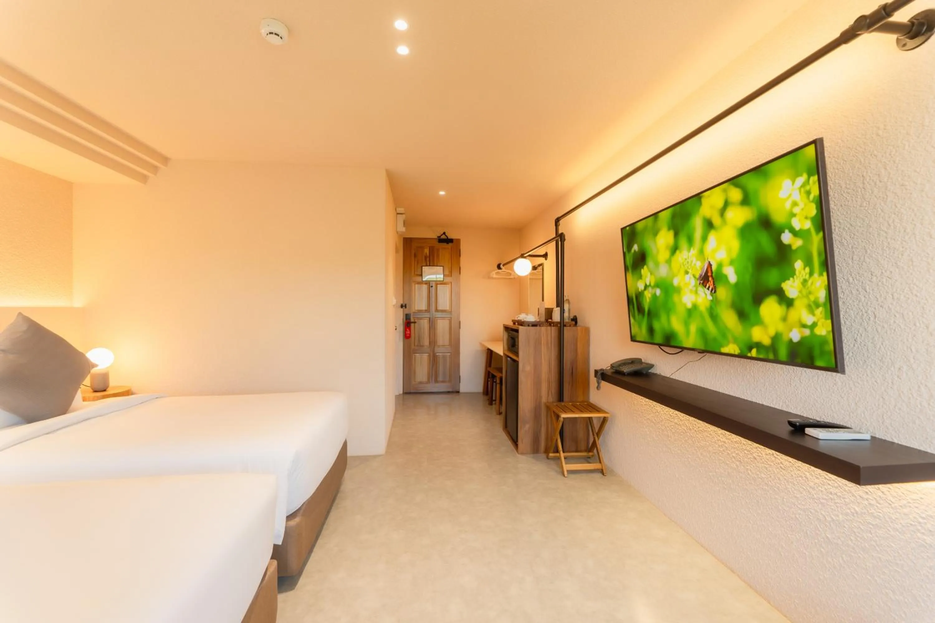 Bed in Mai Hotel Chiang Mai ใหม่โฮเทล เชียงใหม่