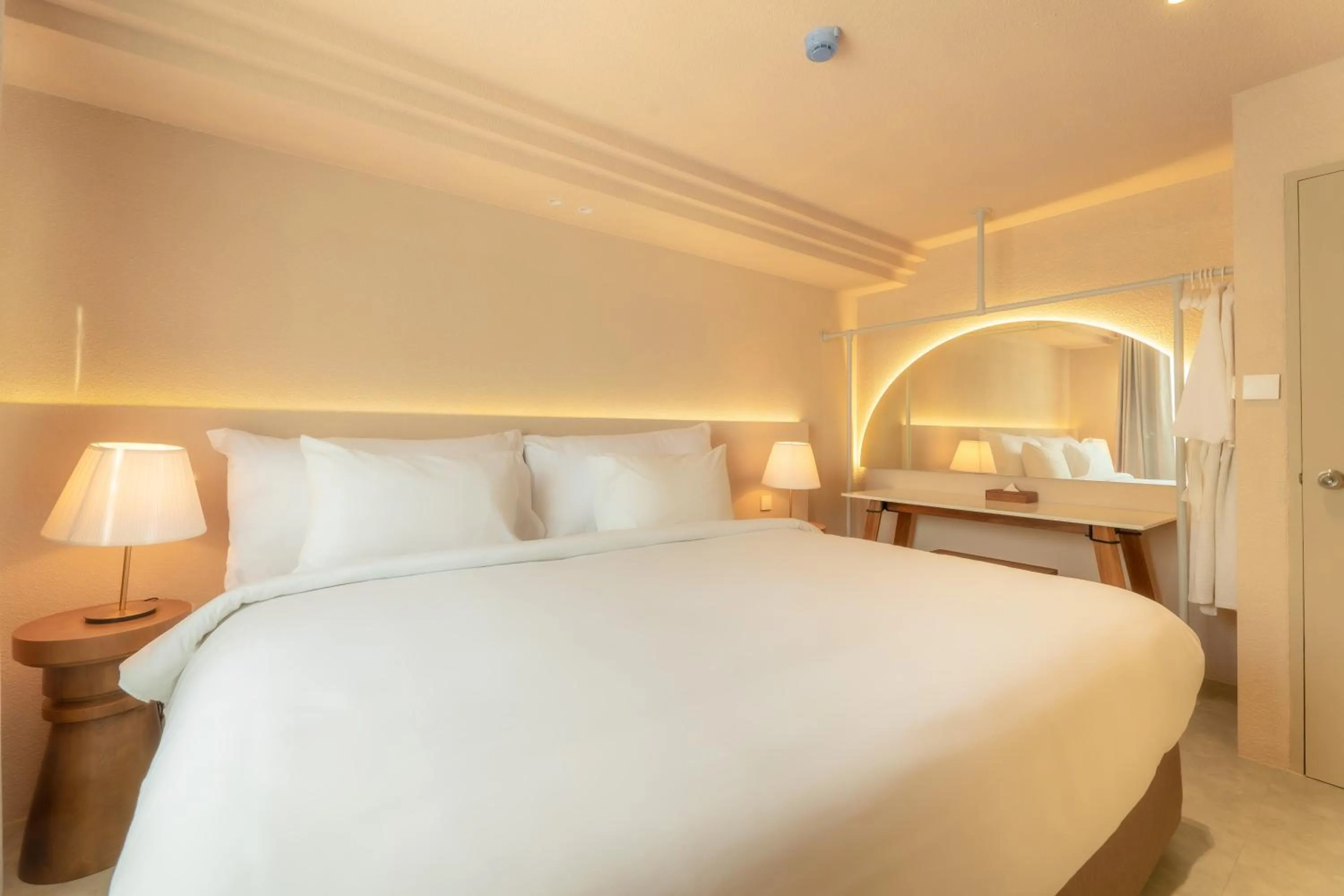 Bed in Mai Hotel Chiang Mai ใหม่โฮเทล เชียงใหม่