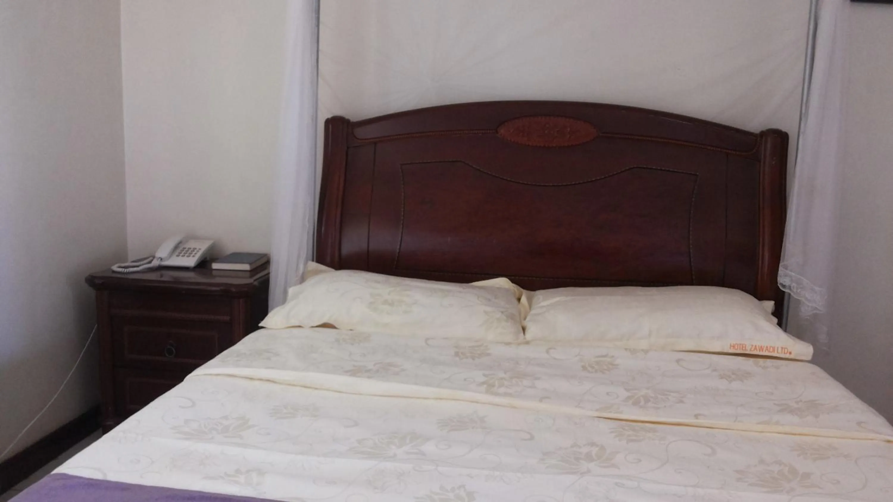 Bedroom in Zawadi Hotel