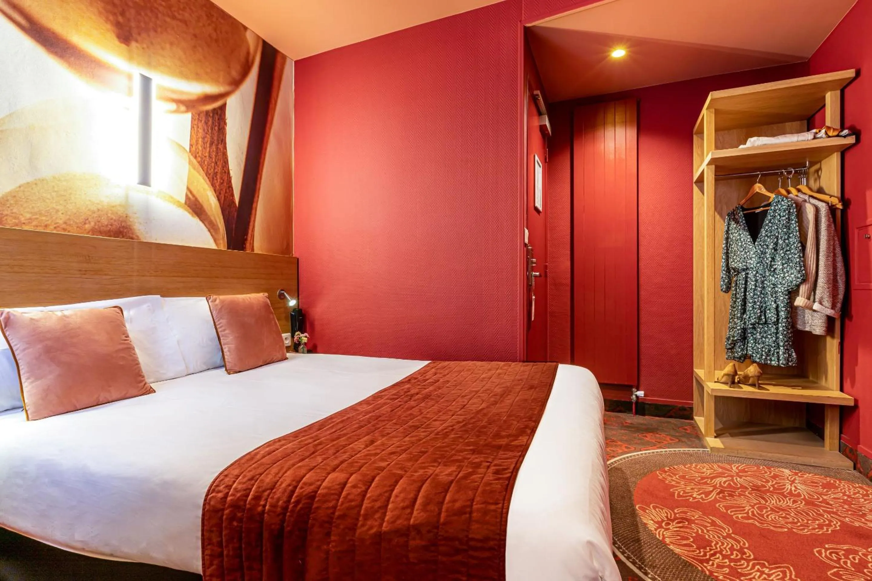 Bed in Hotel Ariane Montparnasse by Patrick Hayat