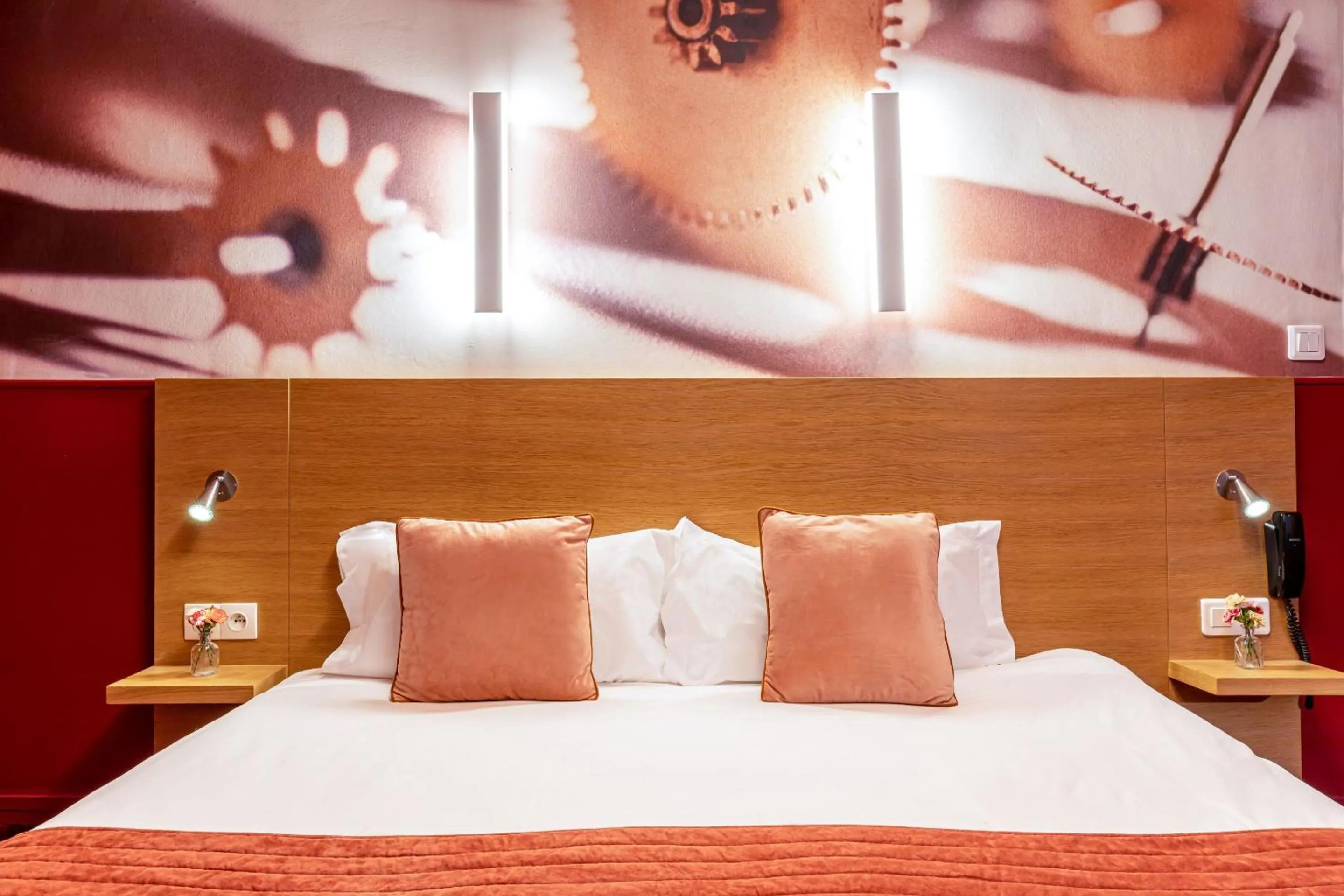 Bed in Hotel Ariane Montparnasse by Patrick Hayat