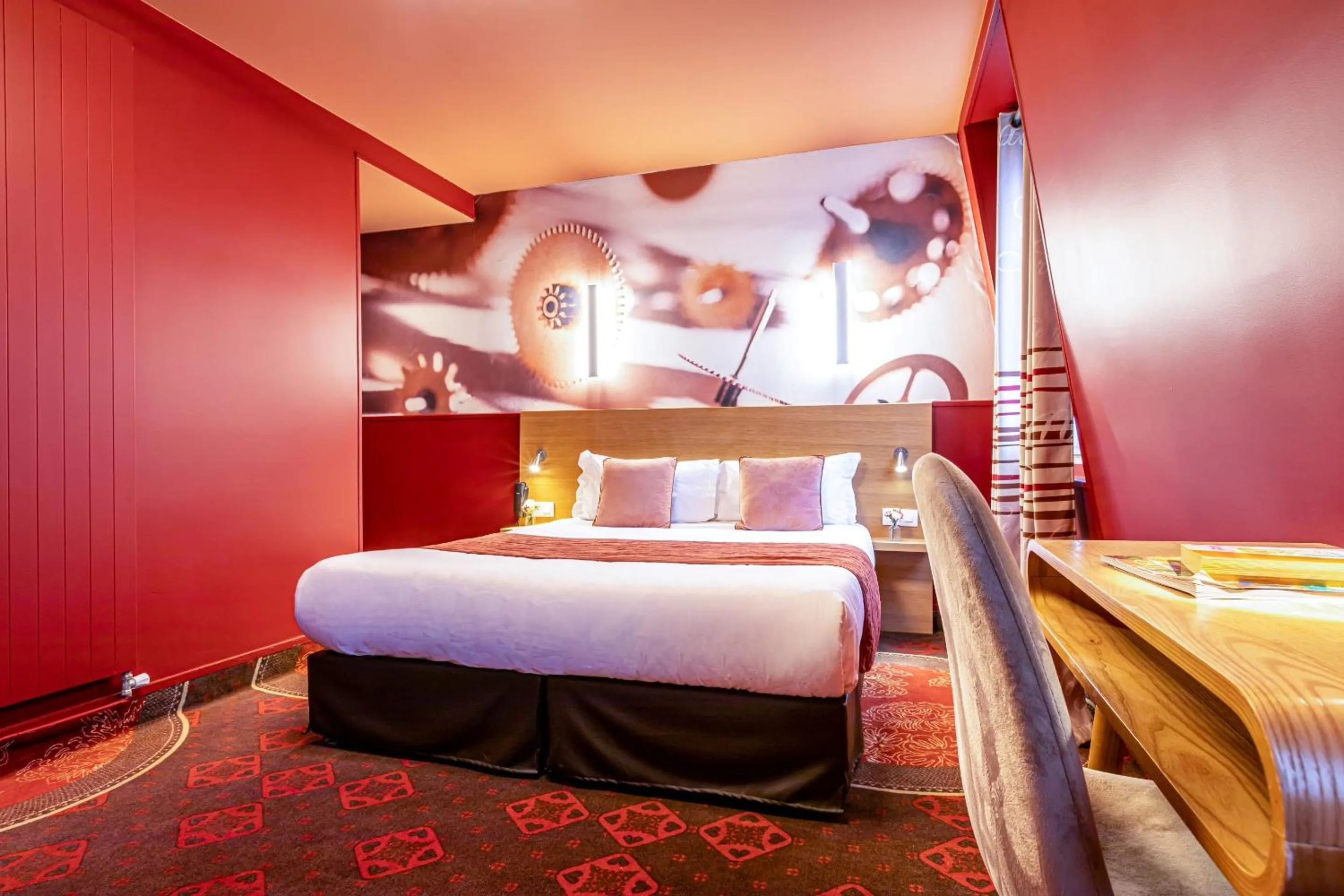 Bed in Hotel Ariane Montparnasse by Patrick Hayat
