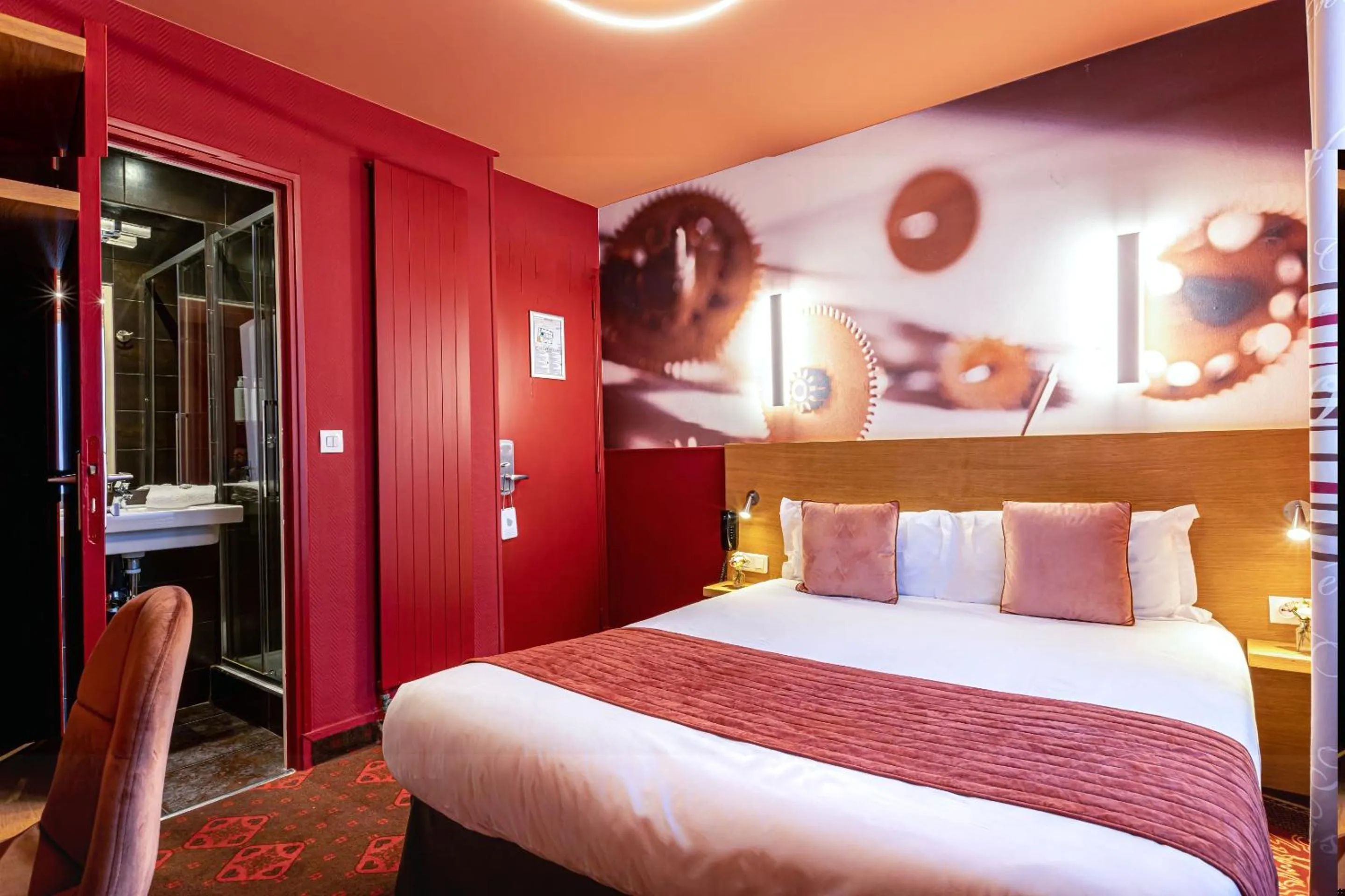 Bed in Hotel Ariane Montparnasse by Patrick Hayat