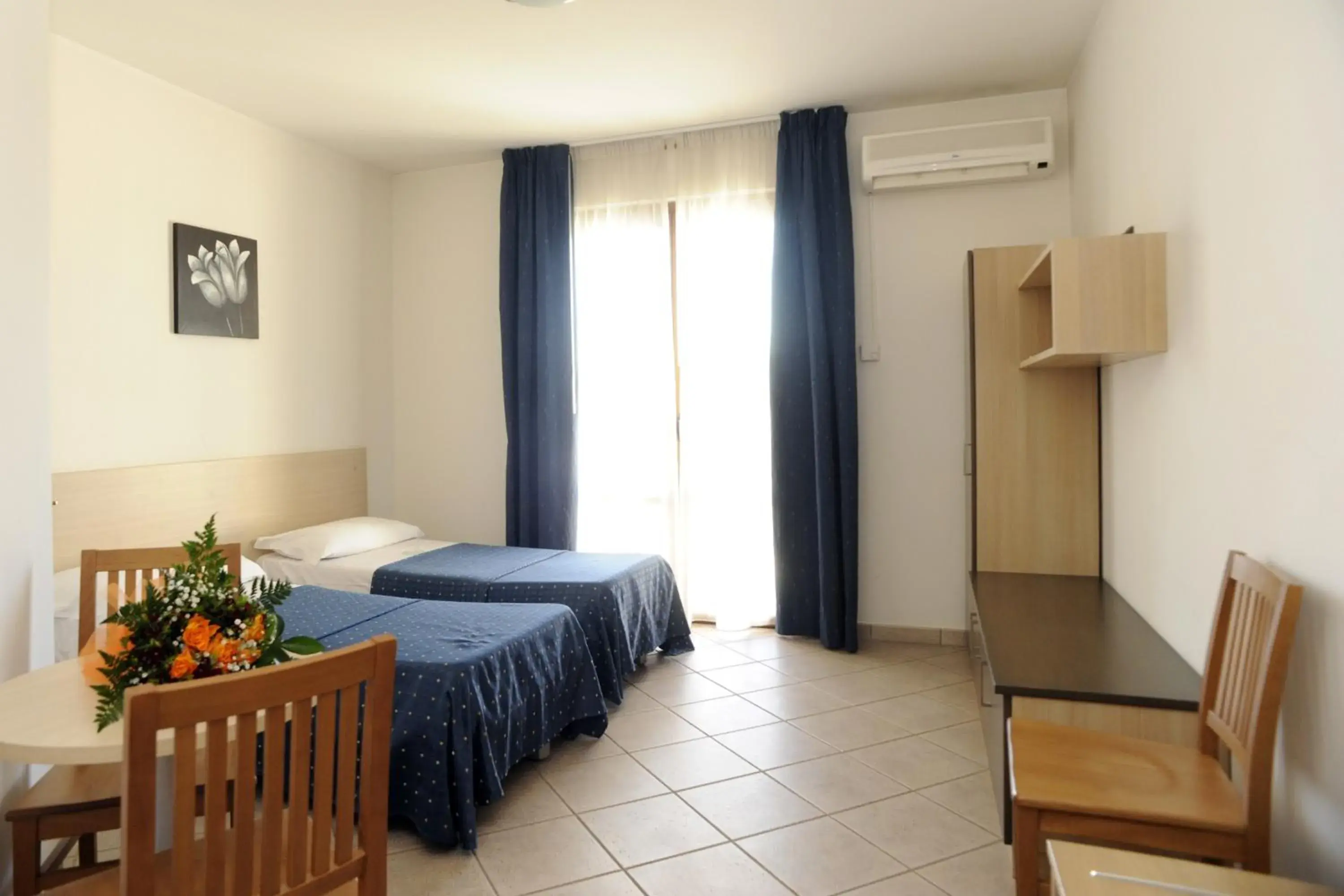 Basic Triple Room in Hotel La Quercia Basic Triple Room in Hotel La Quercia