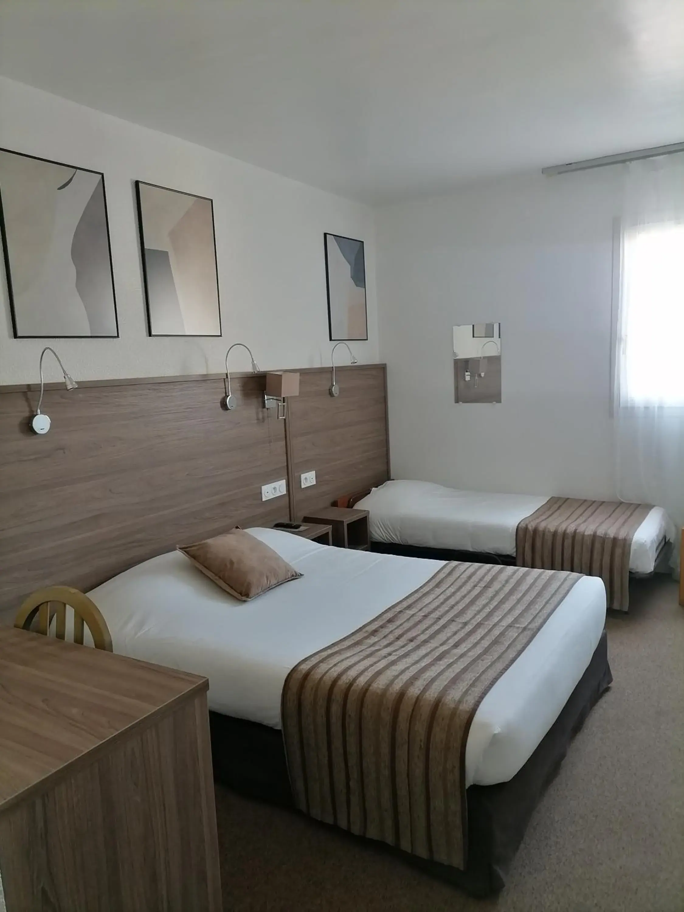 Triple Room Shower-1 Large Bed and 1 Single Bed - single occupancy in La Buissonnière Triple Room Shower-1 Large Bed and 1 Single Bed - single occupancy in La Buissonnière