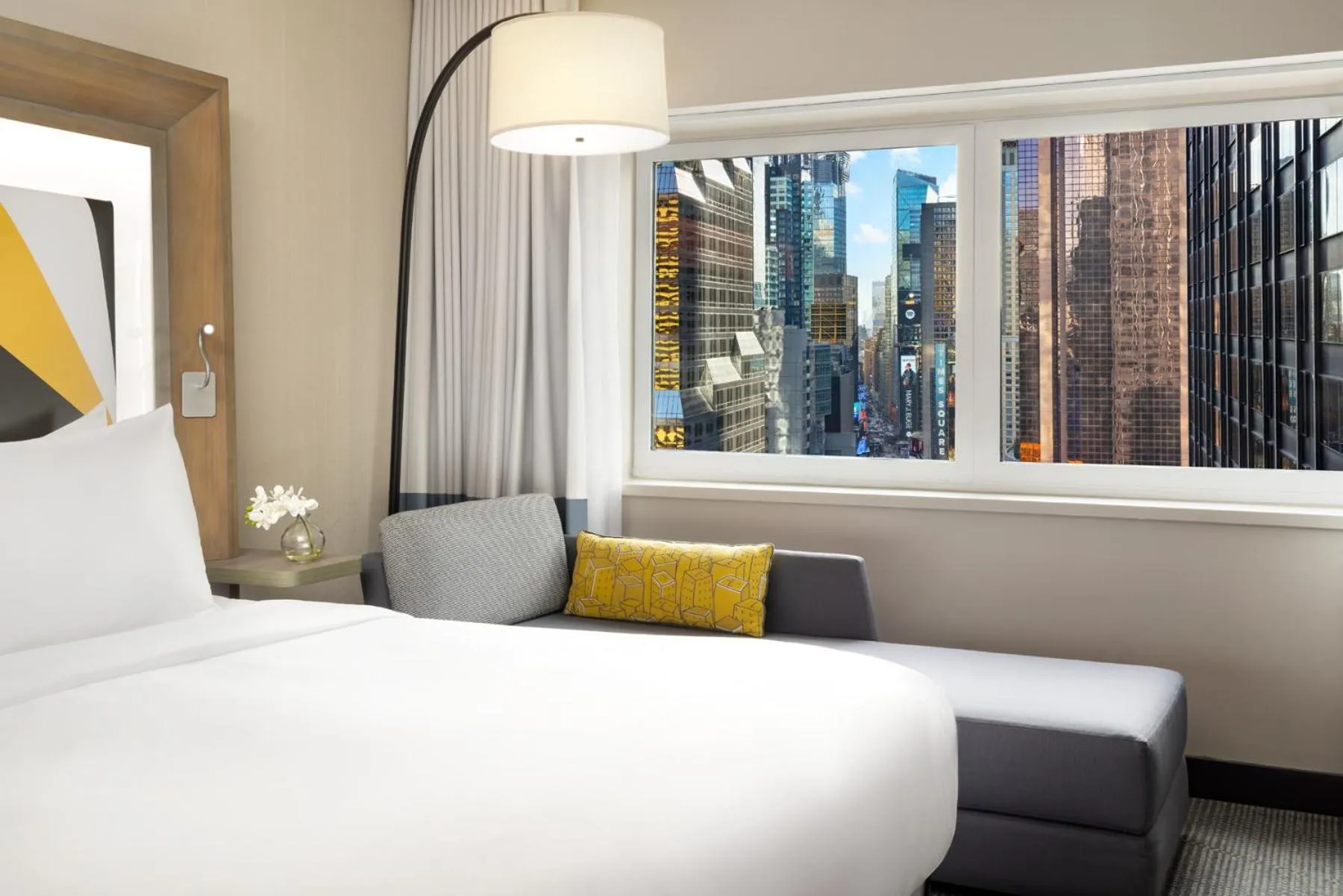 Seating area, Bed in M Social Hotel New York Times Square