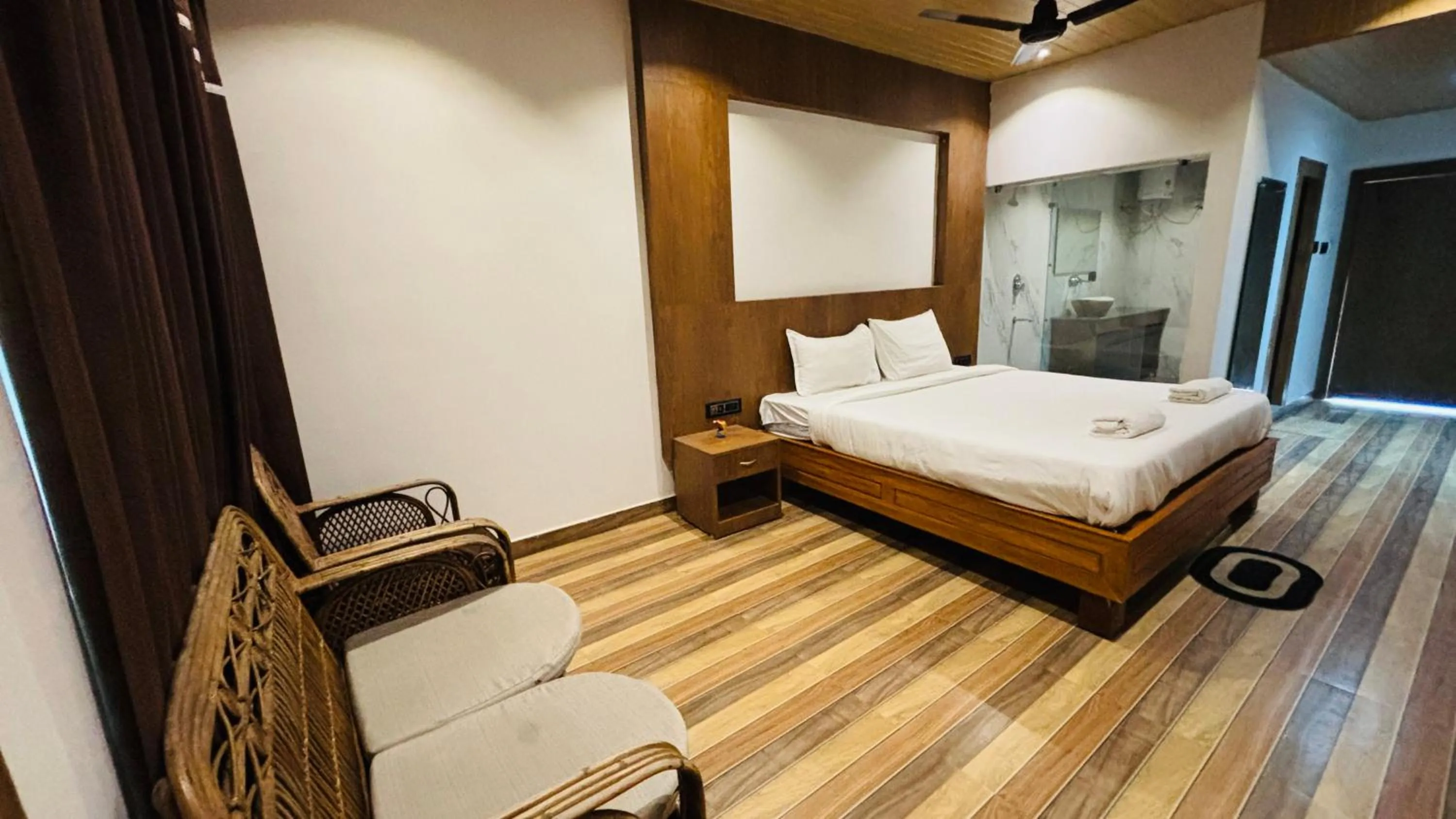 Photo of the whole room, Bed in Kaziranga Eco Village Resort
