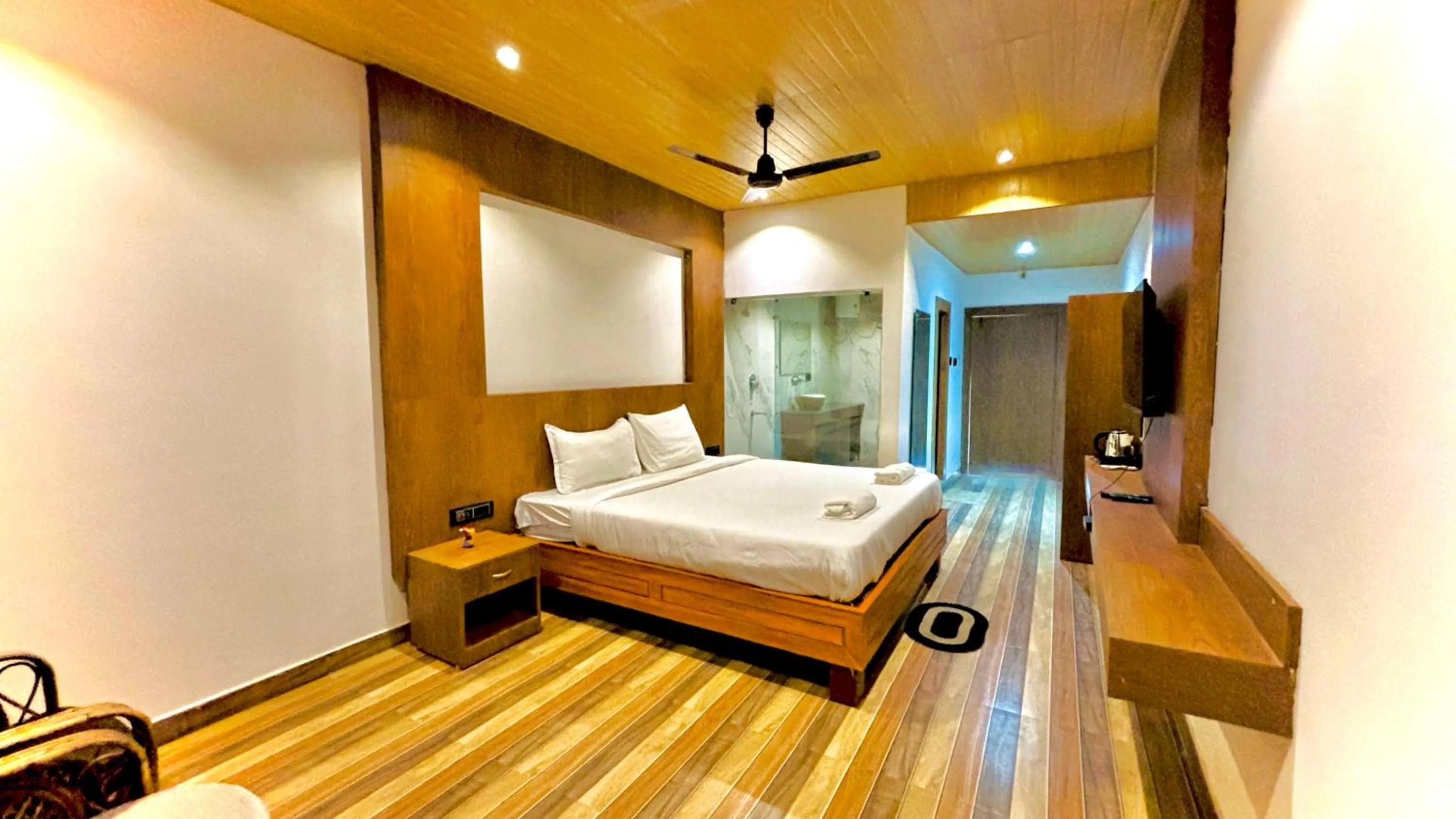 Bed in Kaziranga Eco Village Resort