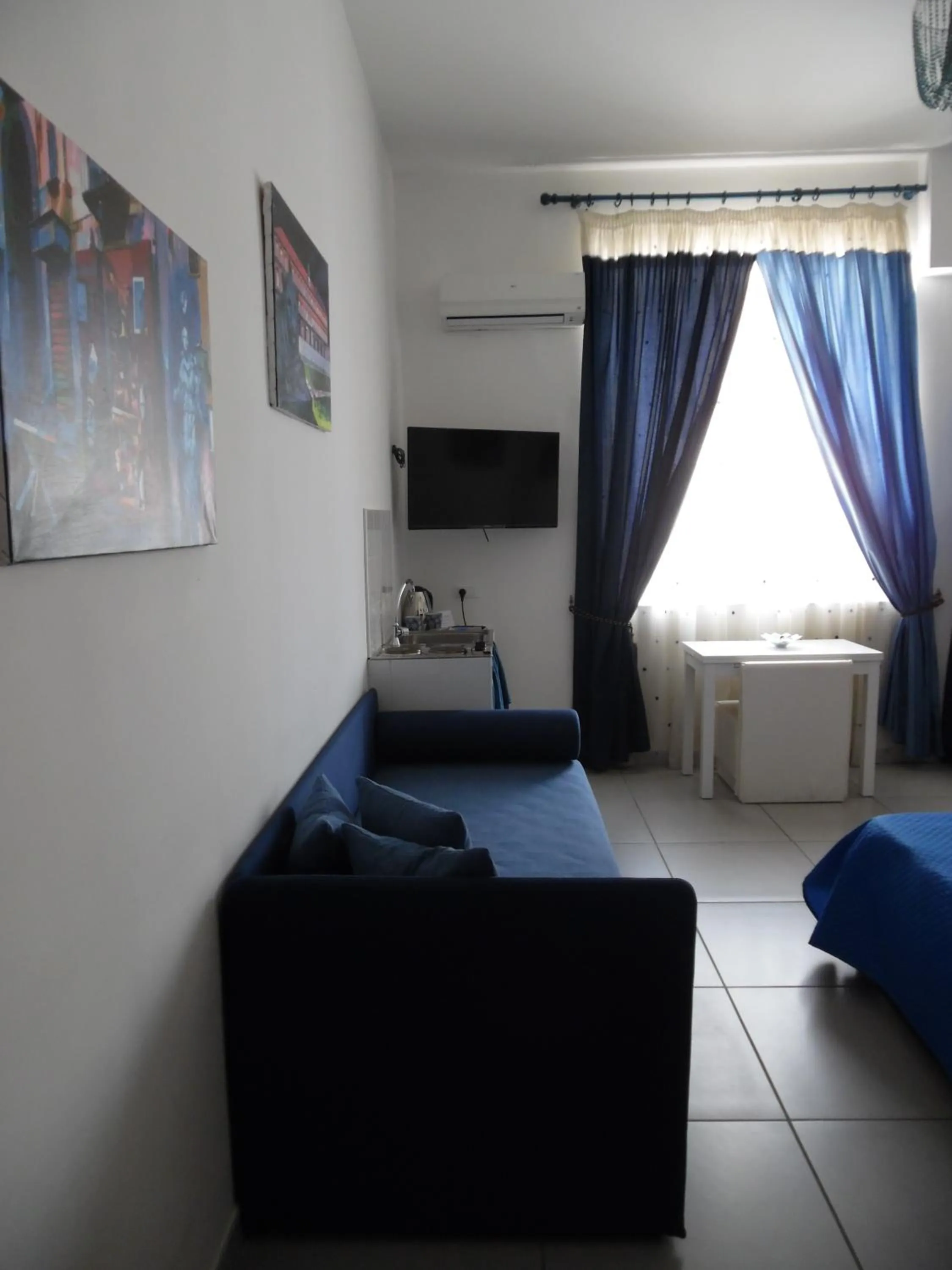 Bedroom in Megaride Santa Lucia