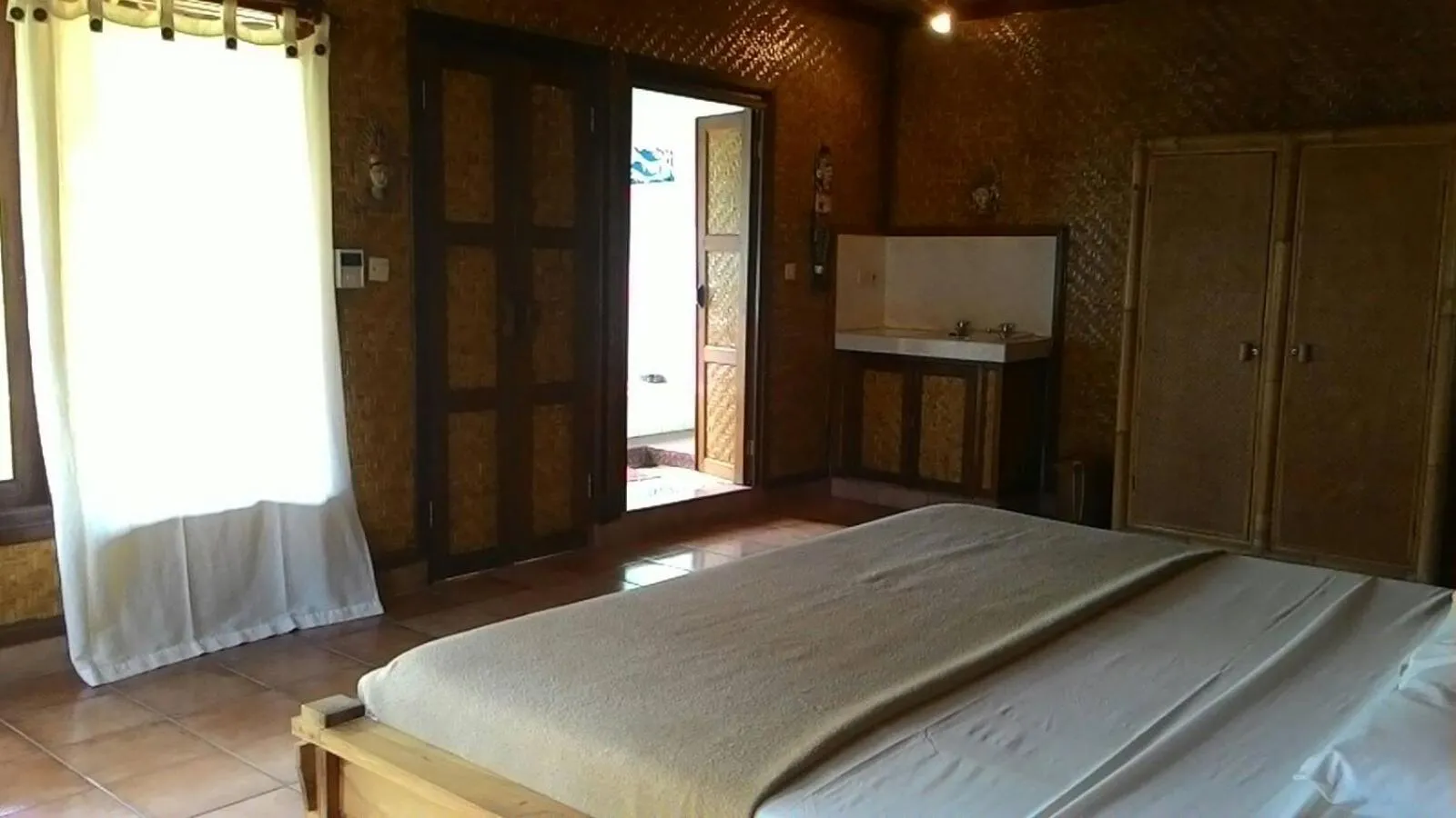 Bed in Sari Wangi Cottage