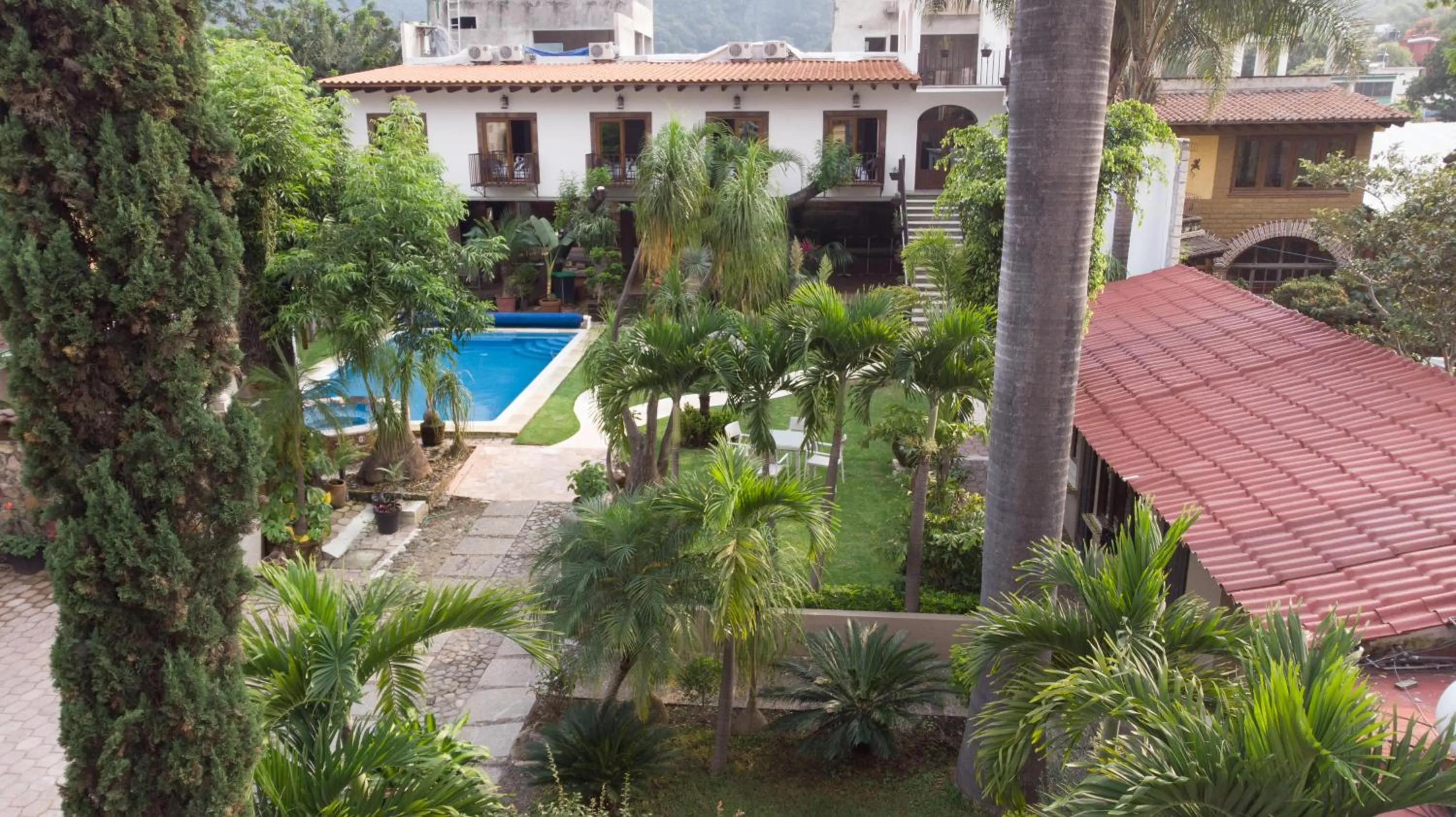 Property building in Hotel Concierge Flor y Canto