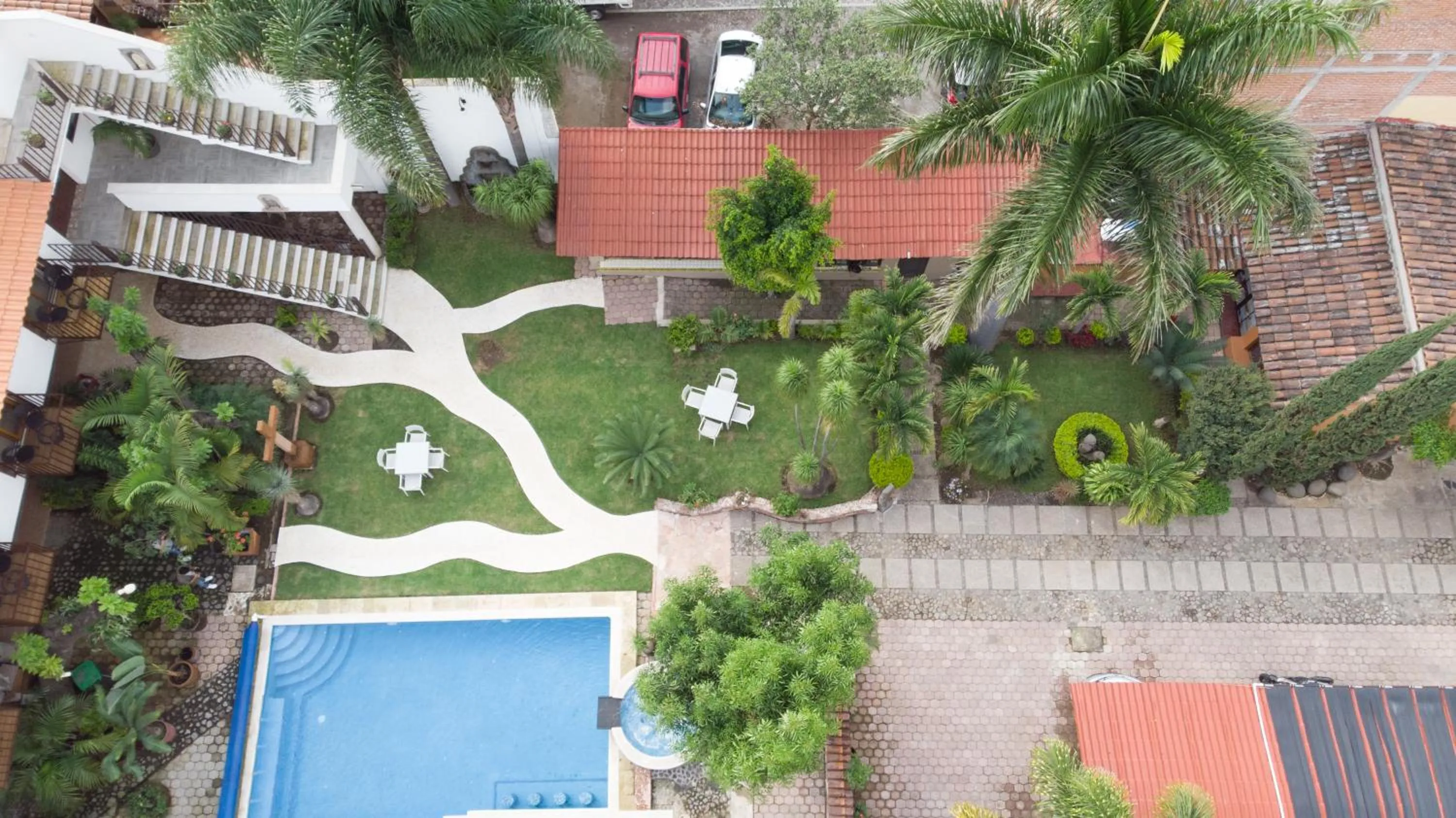 Property building in Hotel Concierge Flor y Canto