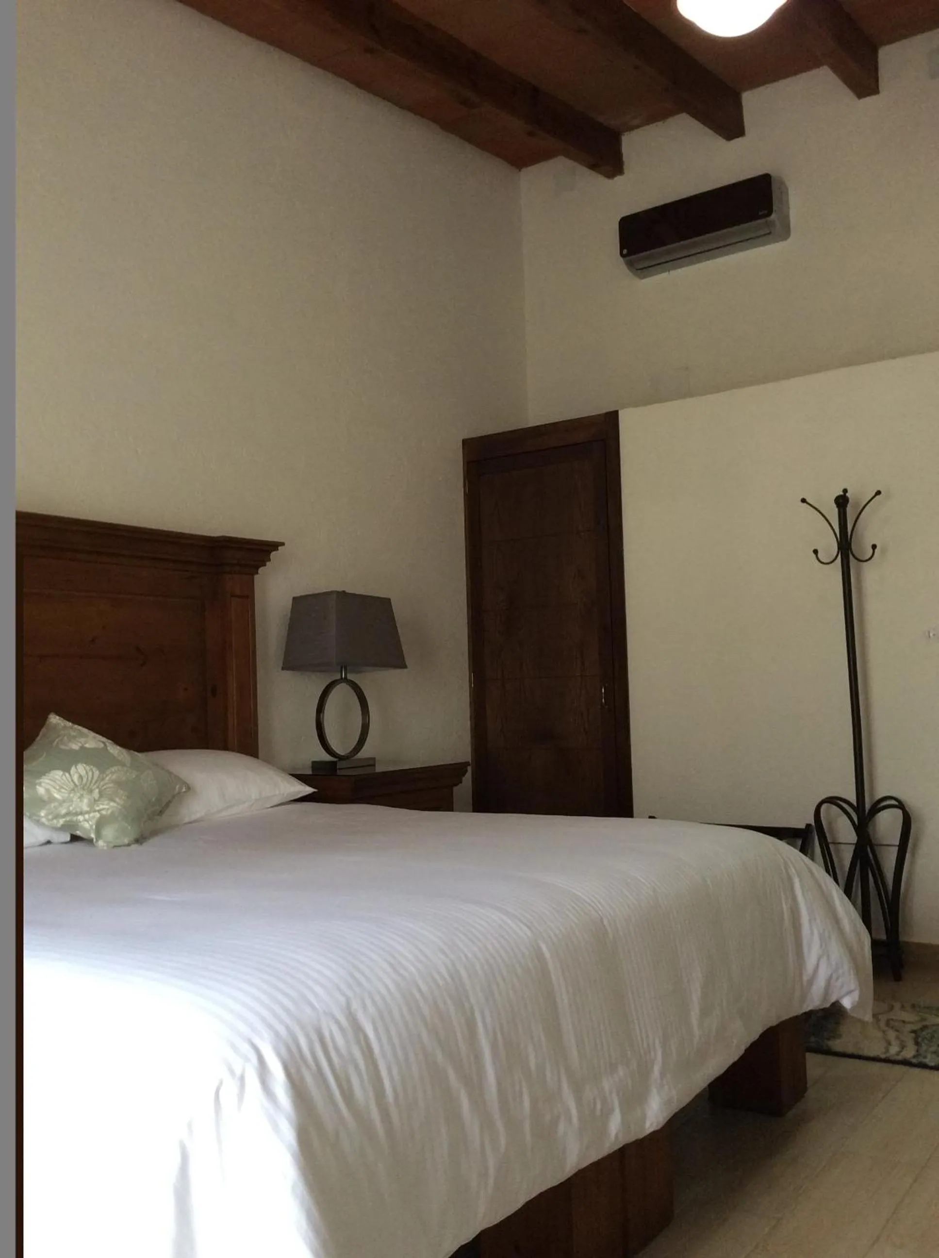 Bed in Hotel Concierge Flor y Canto