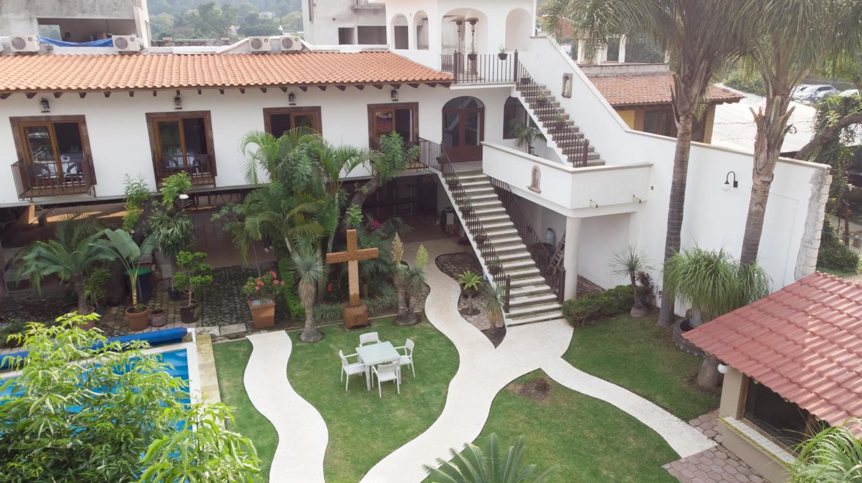 Property building in Hotel Concierge Flor y Canto