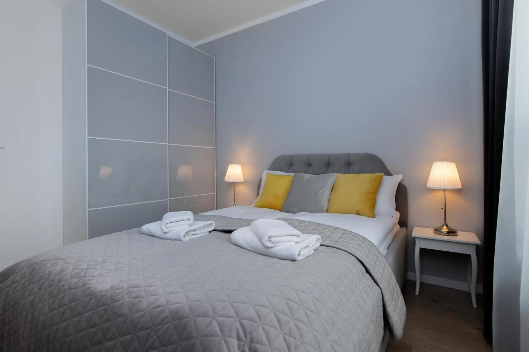 Bed in Symphony Baltica Towers Apartamenty