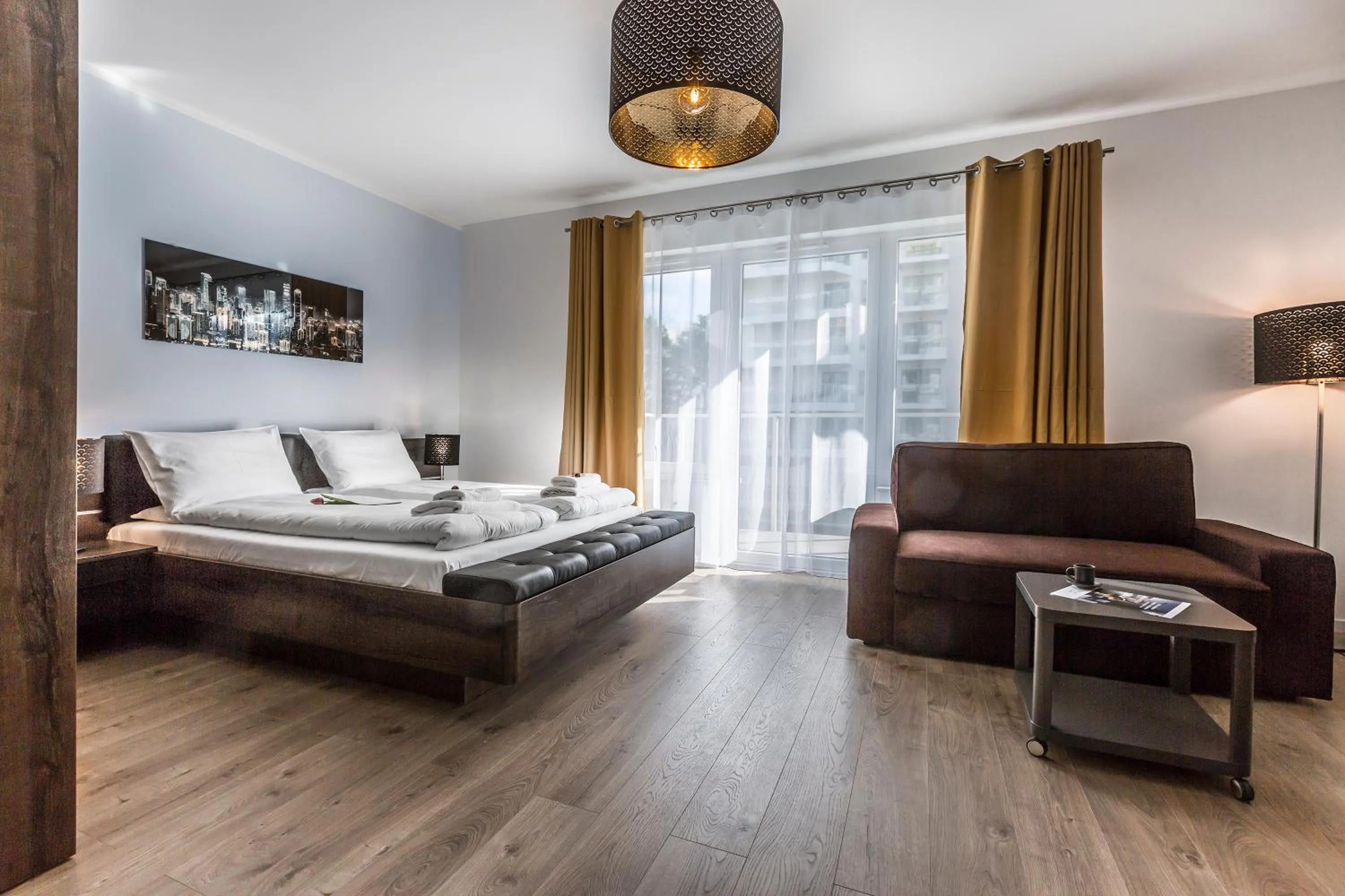 Living room, Bed in Symphony Baltica Towers Apartamenty