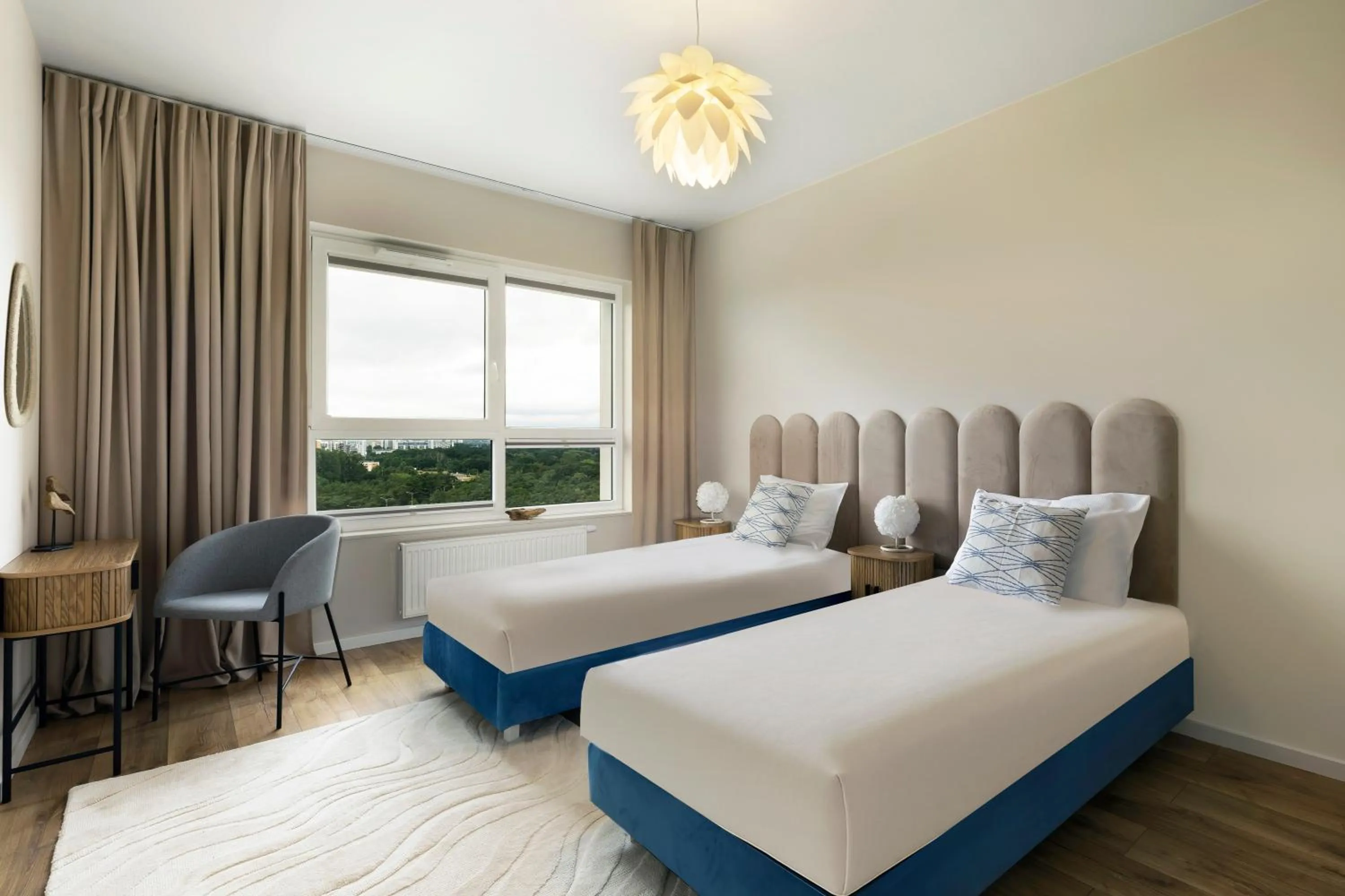 Bed in Symphony Baltica Towers Apartamenty