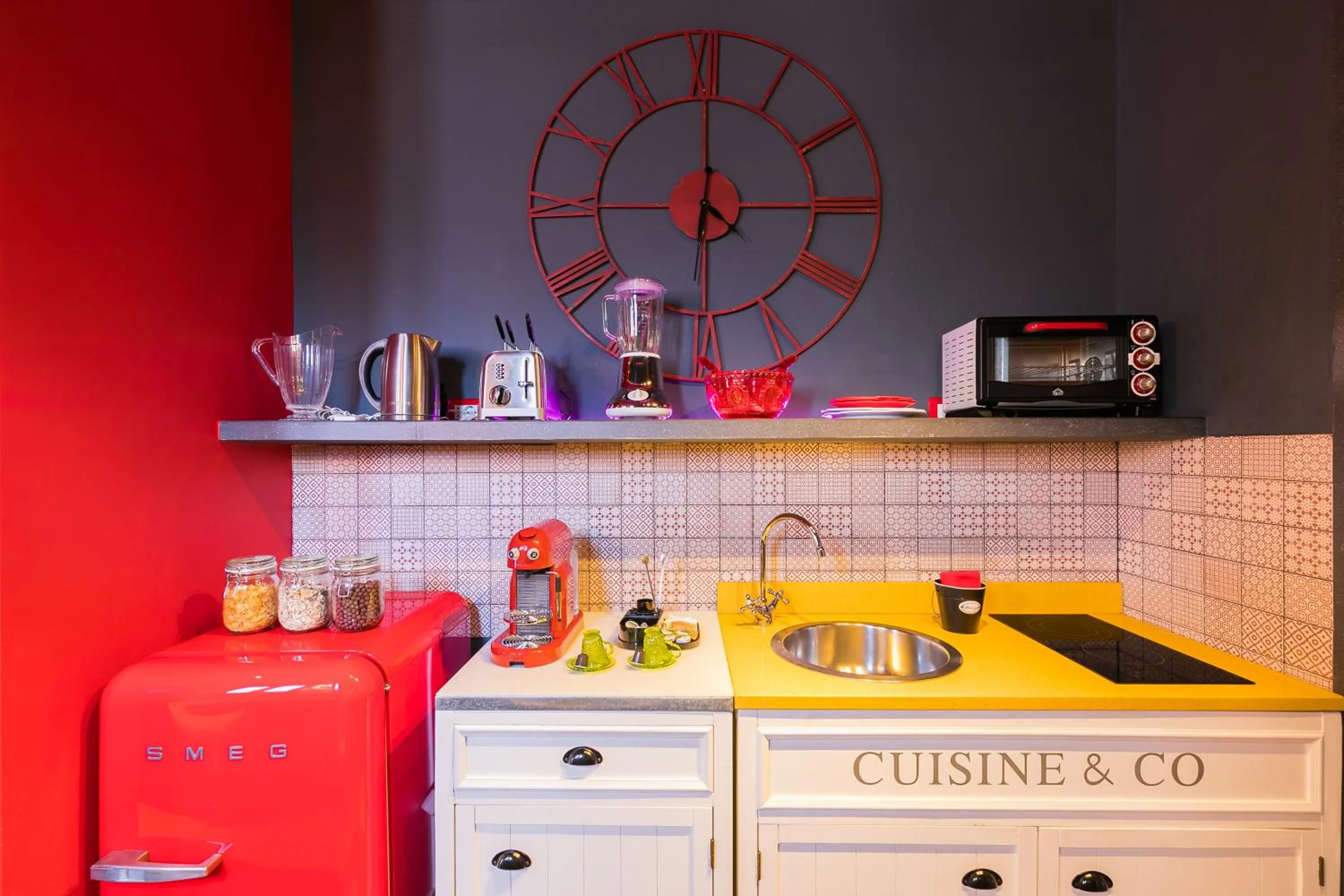 Kitchen or kitchenette in Appartamenti MarcoAurelio49