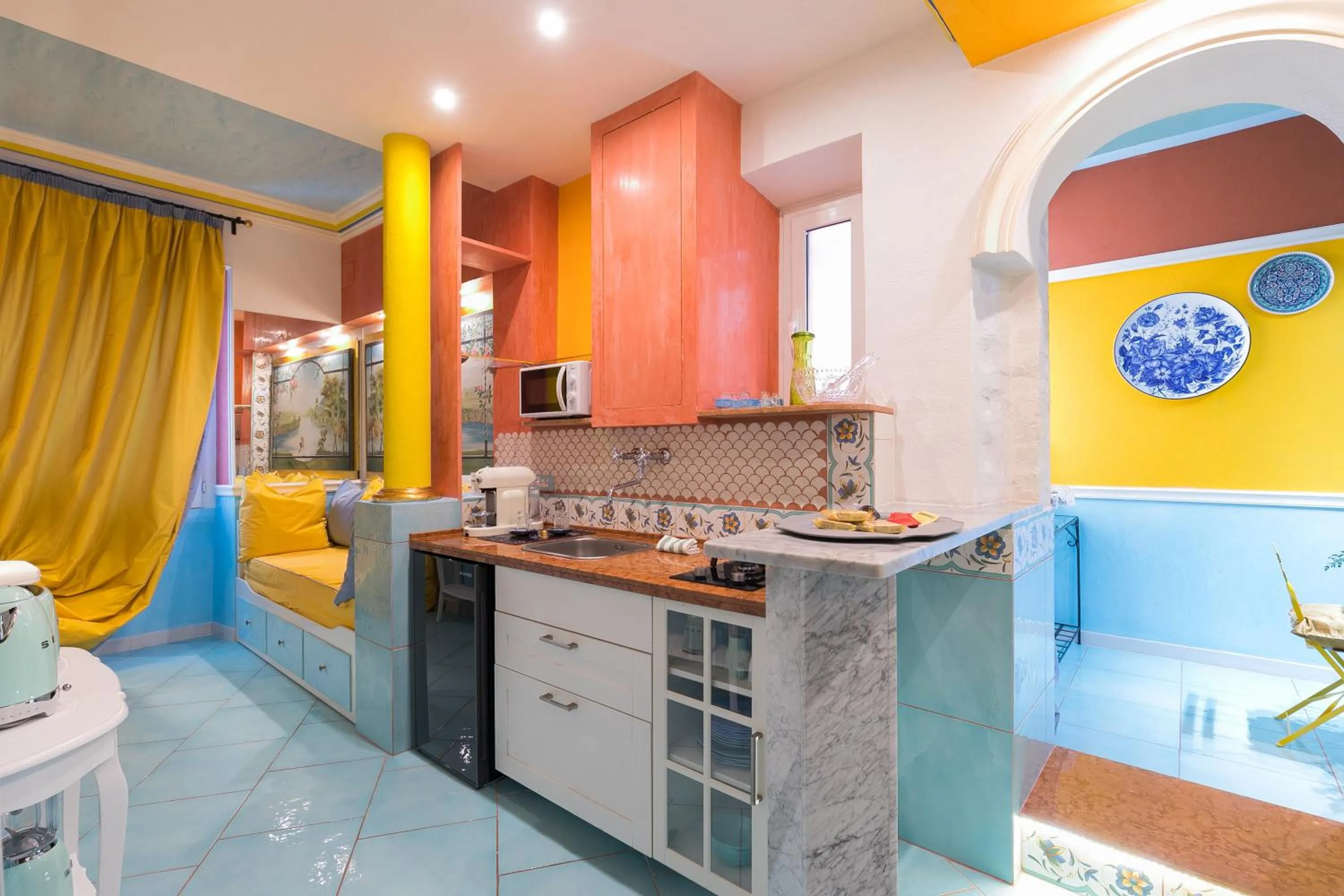 Kitchen or kitchenette in Appartamenti MarcoAurelio49