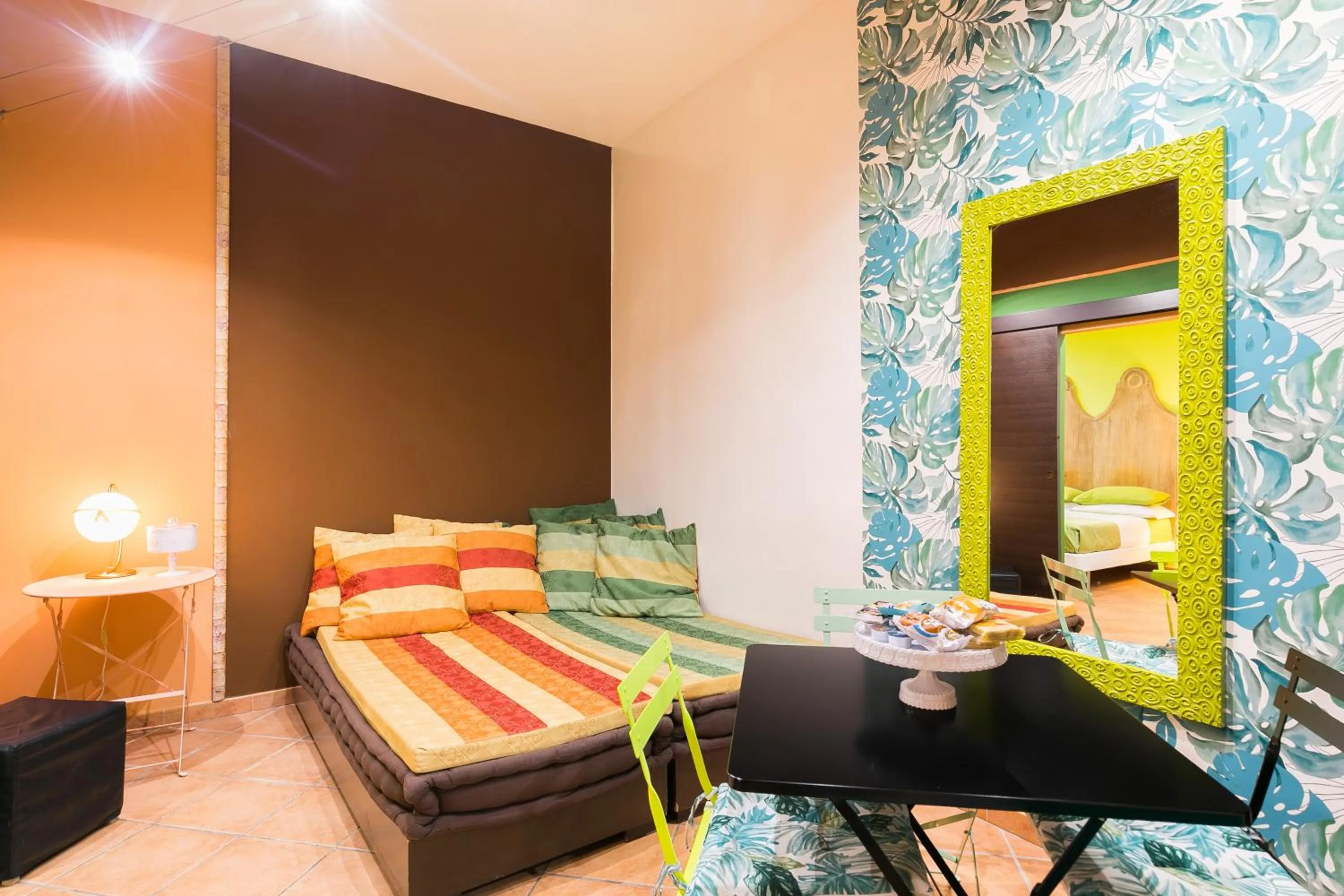 Living room, Bed in Appartamenti MarcoAurelio49