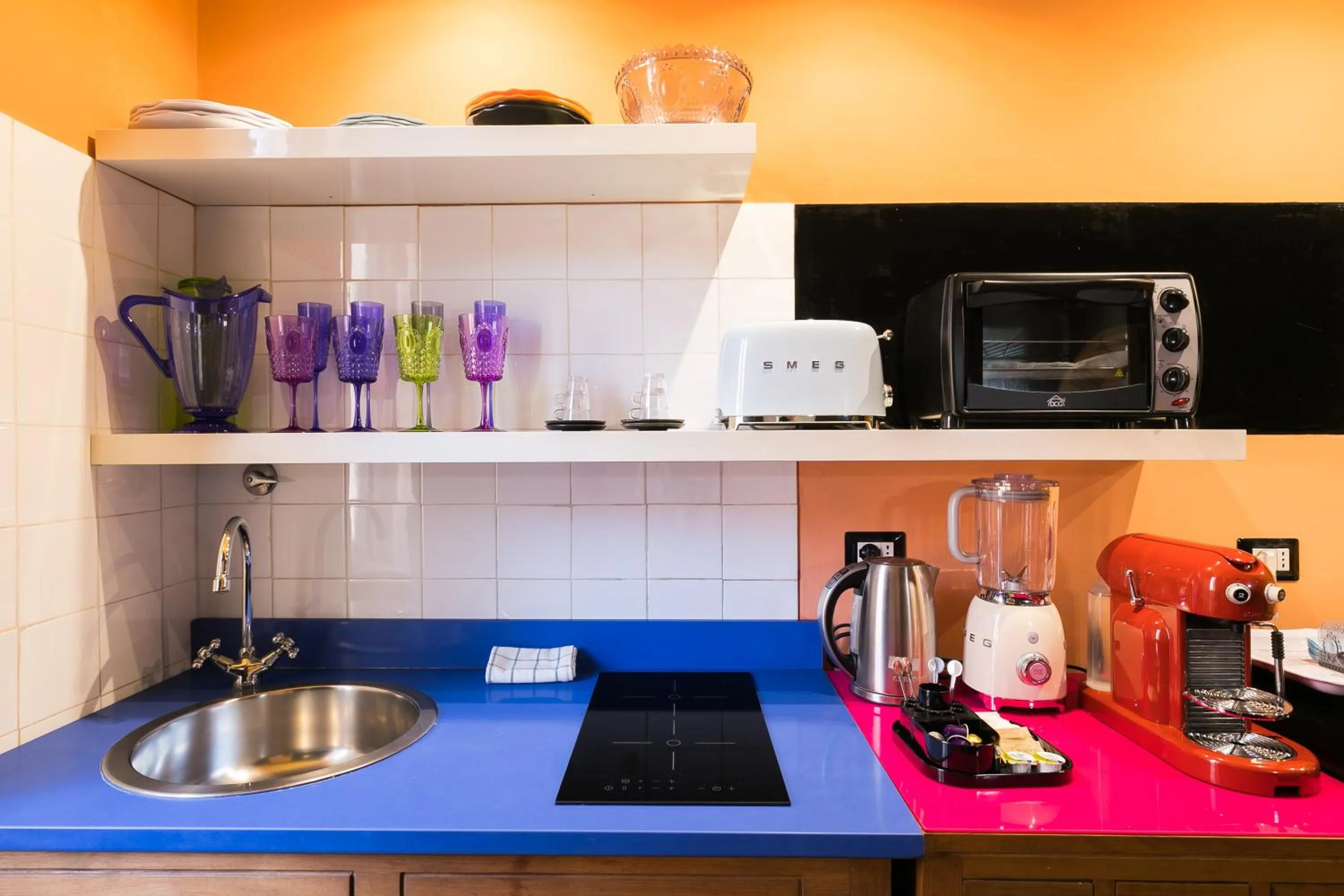 Kitchen or kitchenette in Appartamenti MarcoAurelio49