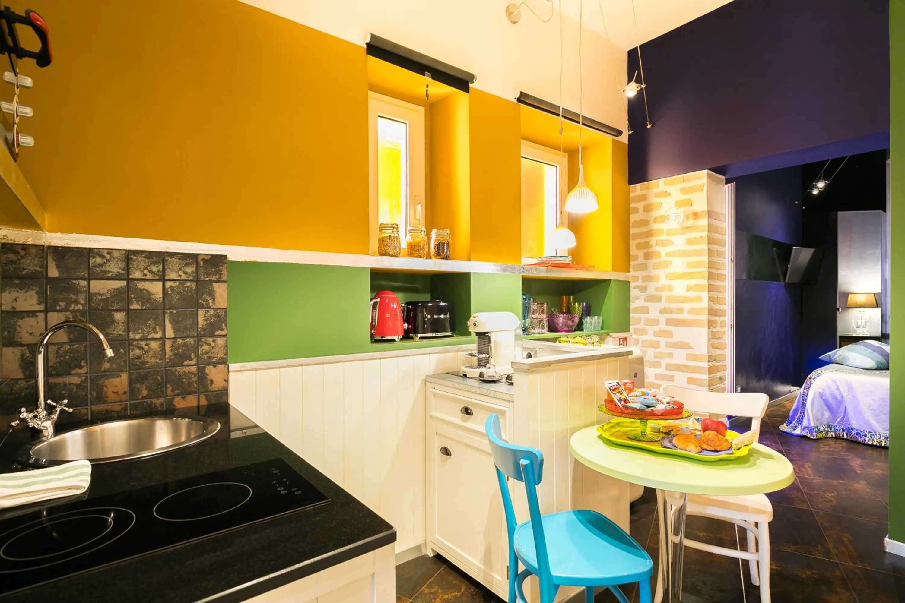 Kitchen or kitchenette in Appartamenti MarcoAurelio49