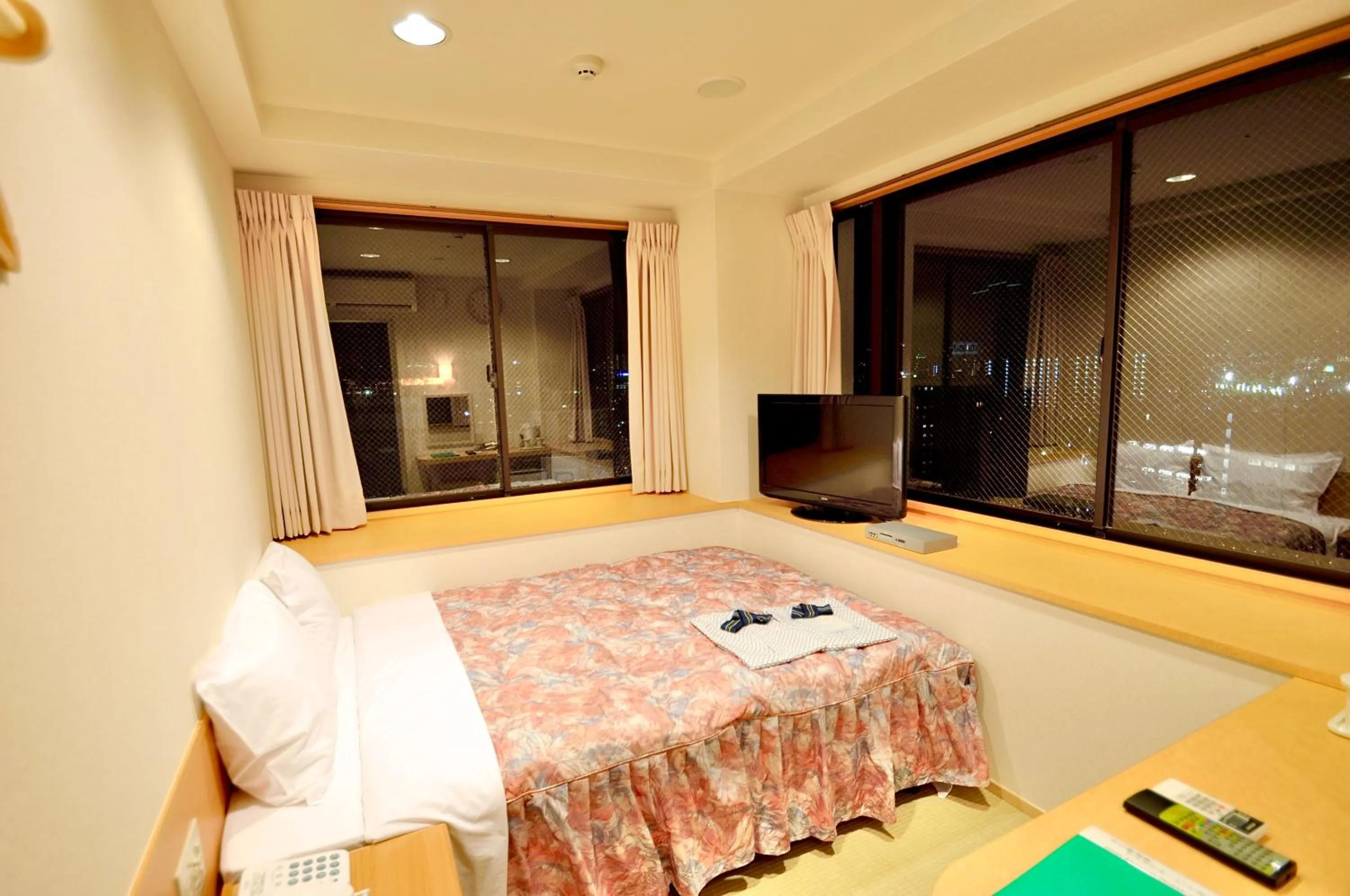 Photo of the whole room, Bed in Kyoto Universal Hotel Karasuma