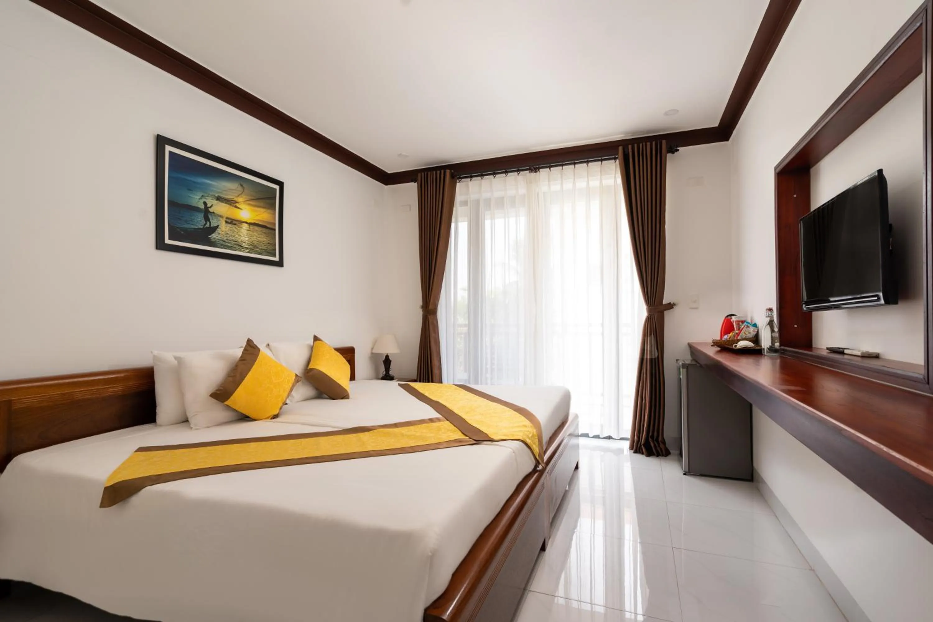 Communal lounge/ TV room, Bed in Haemer Villa Hoi An