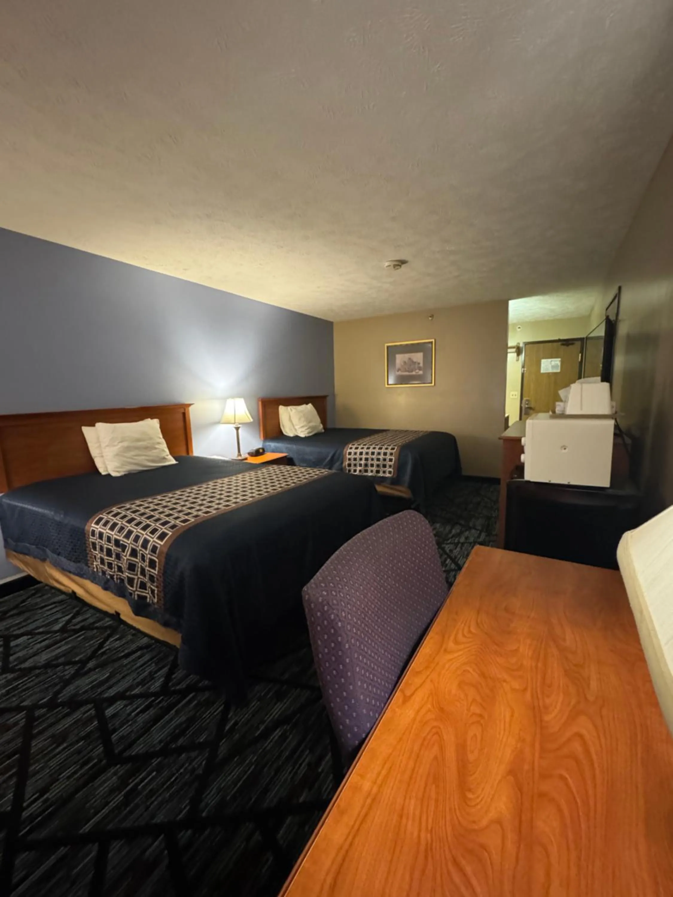 Bed in VICTORIAN INN